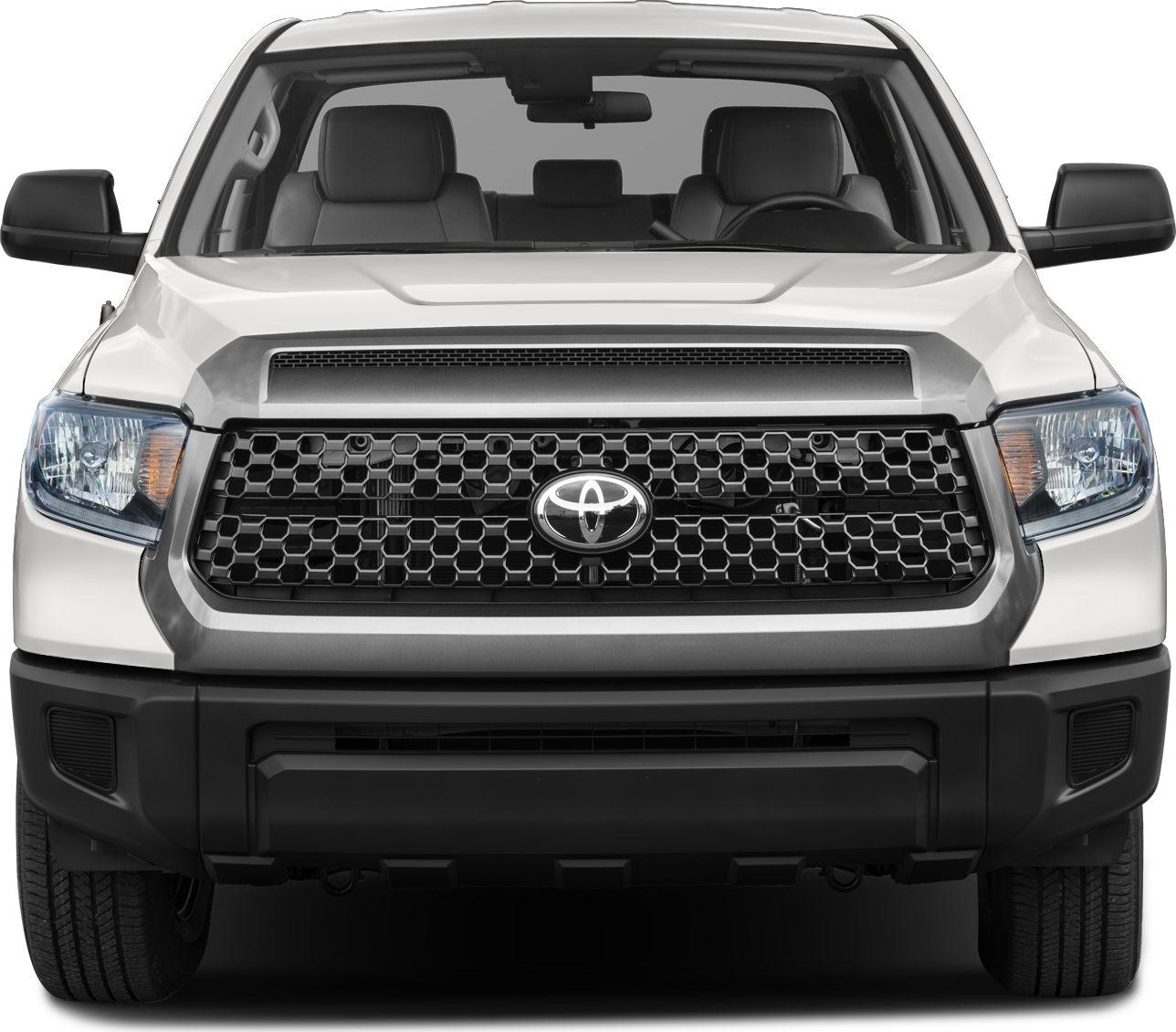 Close-up of truck honeycomb grille with headlights and hood details