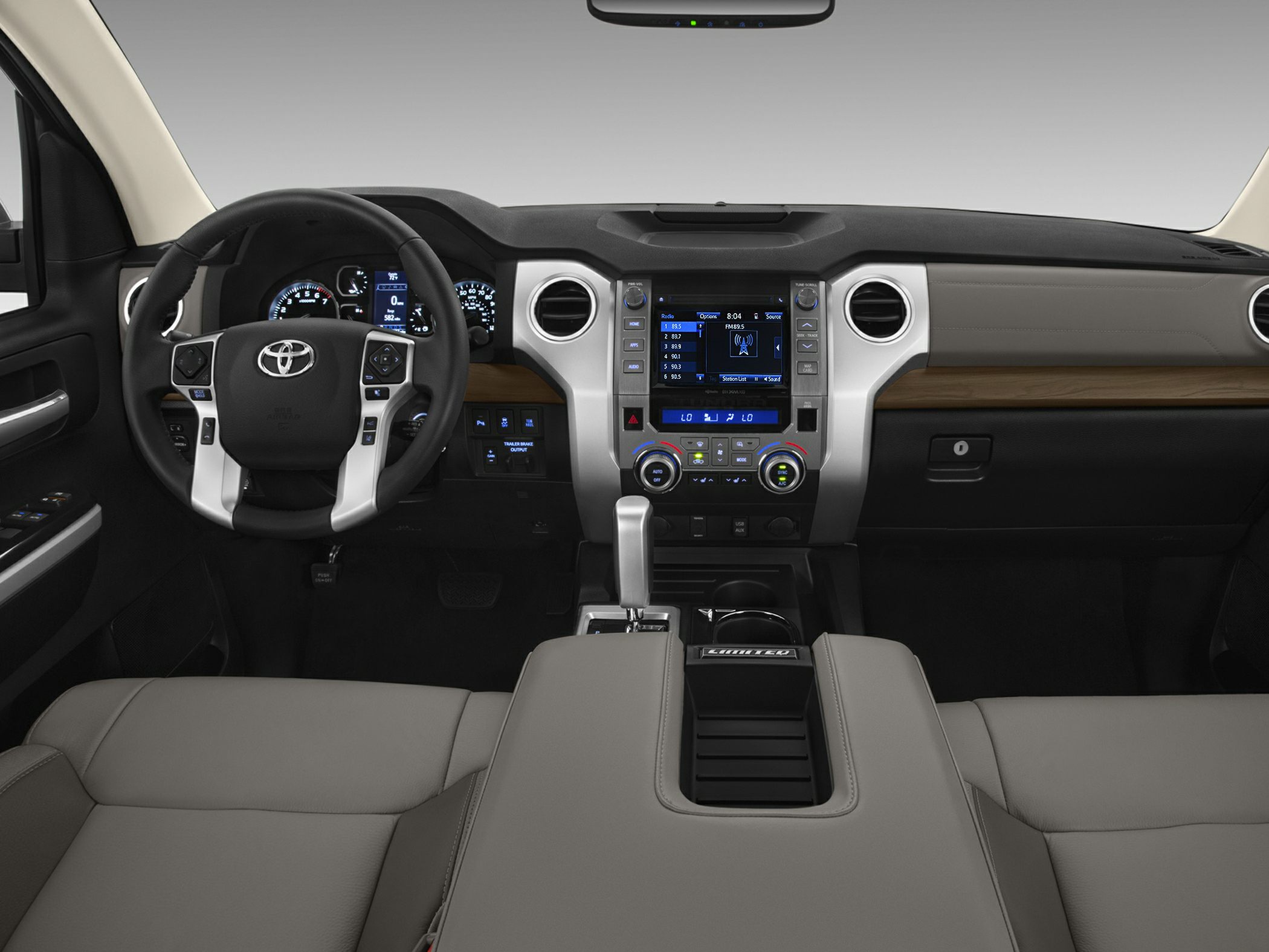 Dashboard and steering wheel with multimedia system and climate controls