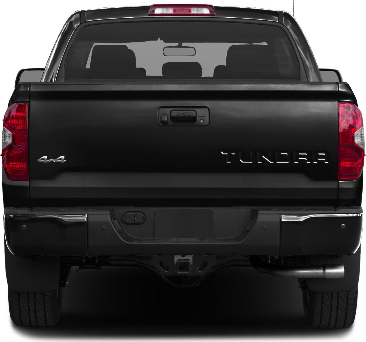 Tailgate view with 4x4 badge and exhaust pipe