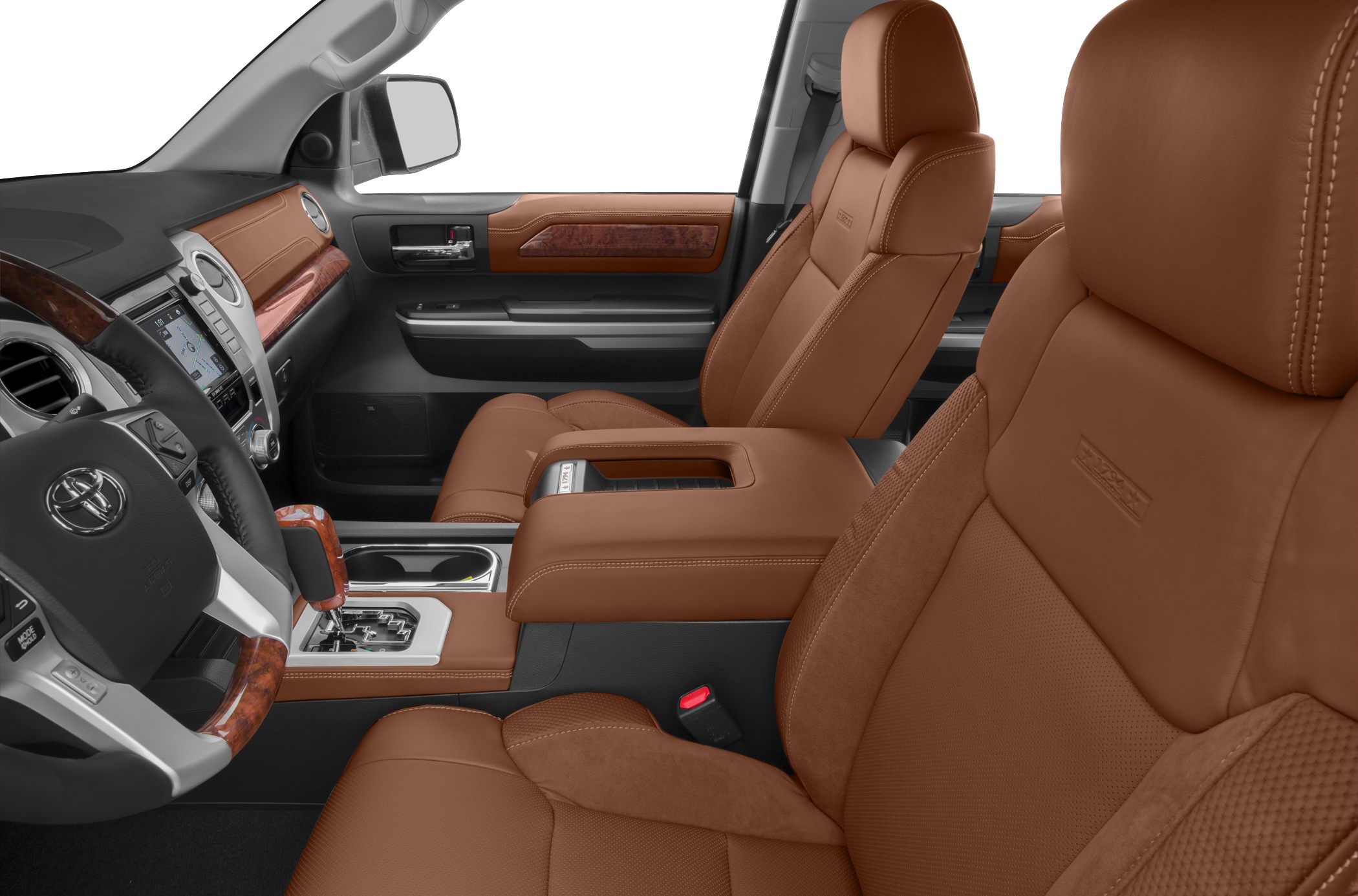 Brown leather seats and wood trim dashboard and door panels.