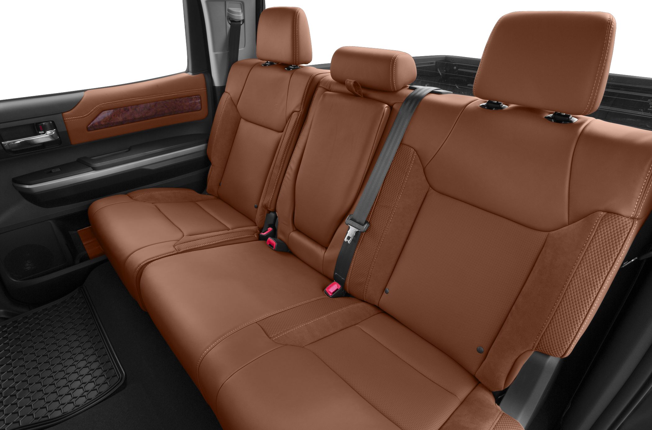 Brown leather rear seats with headrests and seat belt in pickup interior