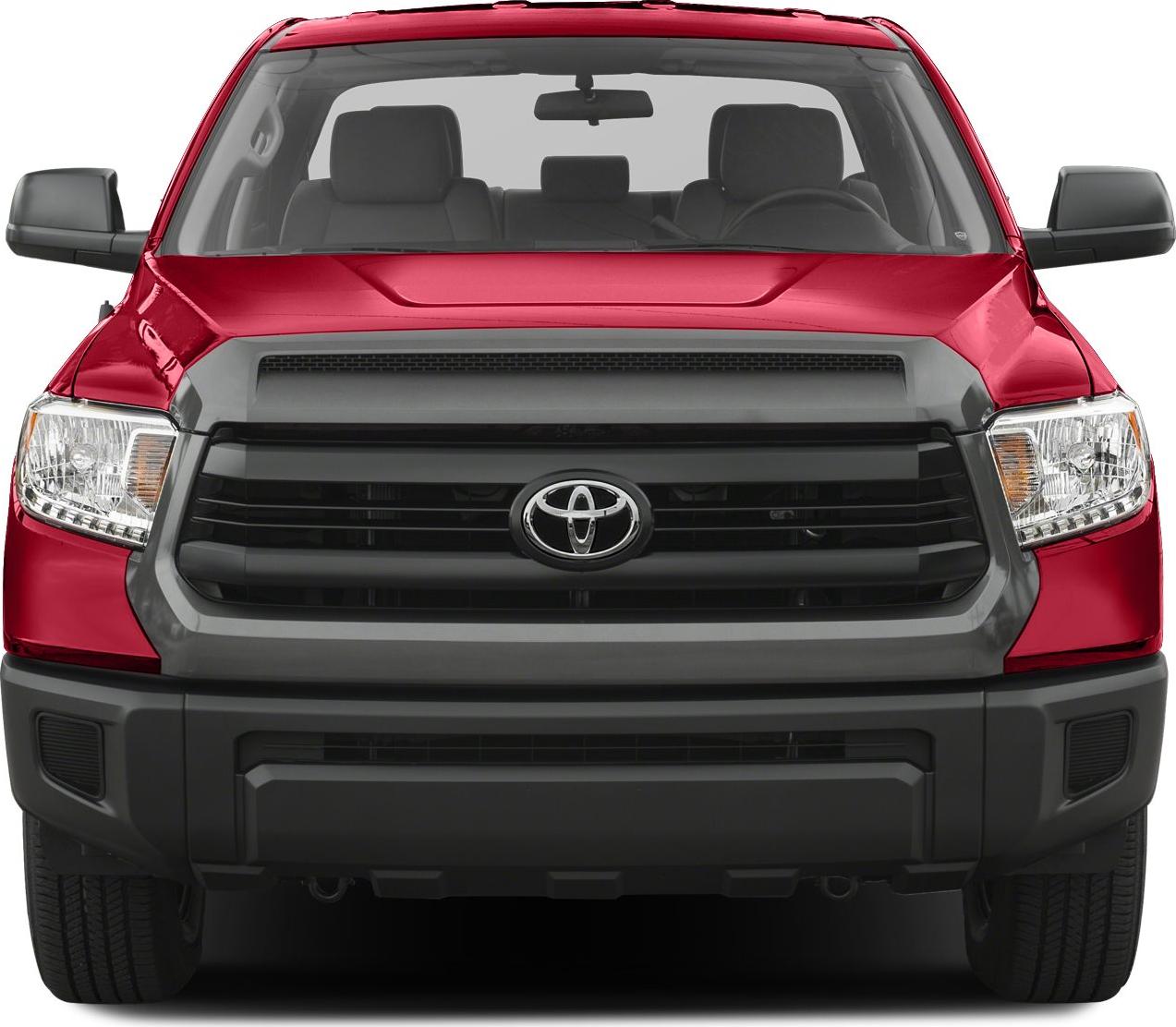 Front grille and headlights of red pickup truck