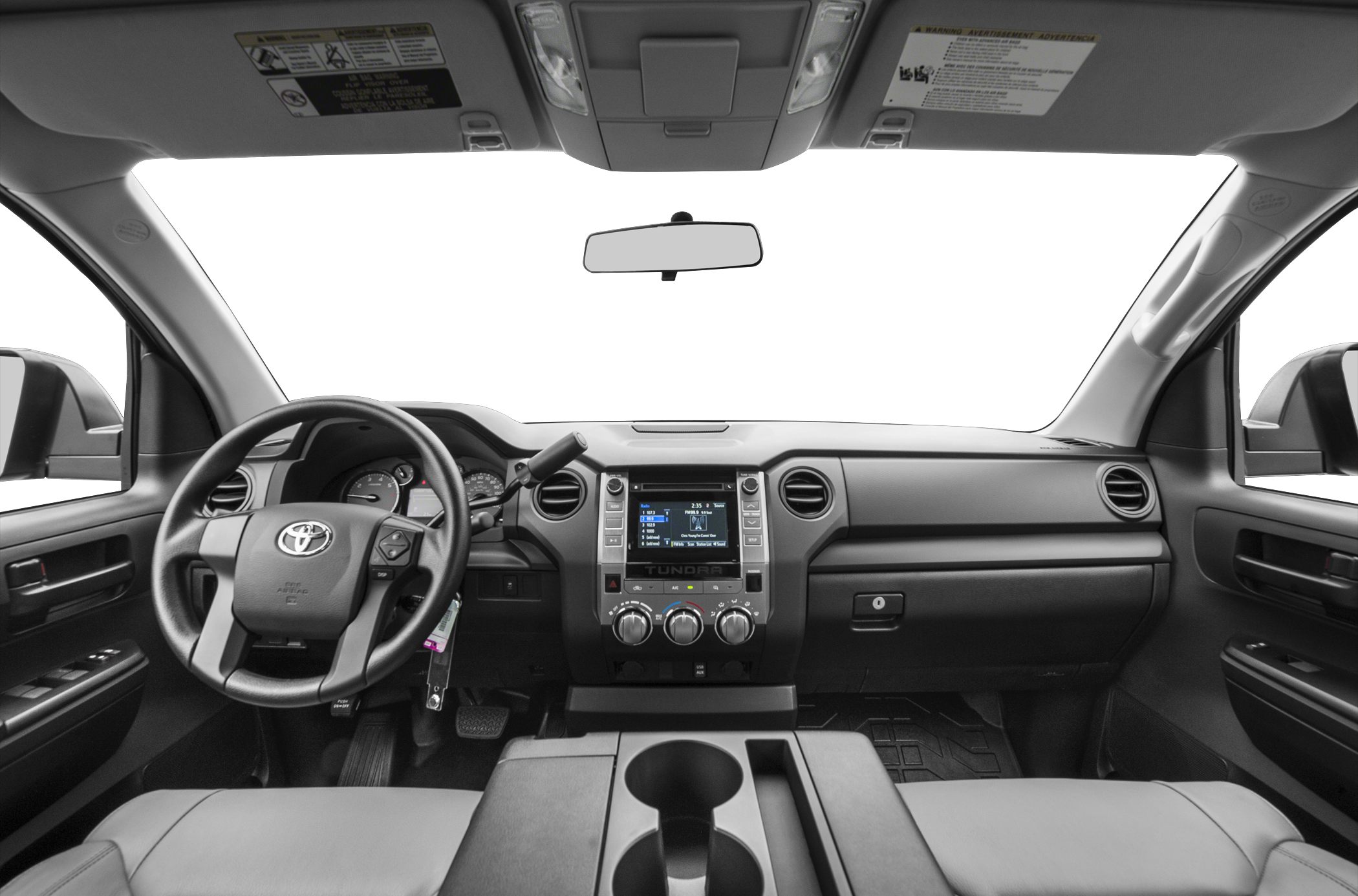 Interior dashboard and steering wheel of a truck