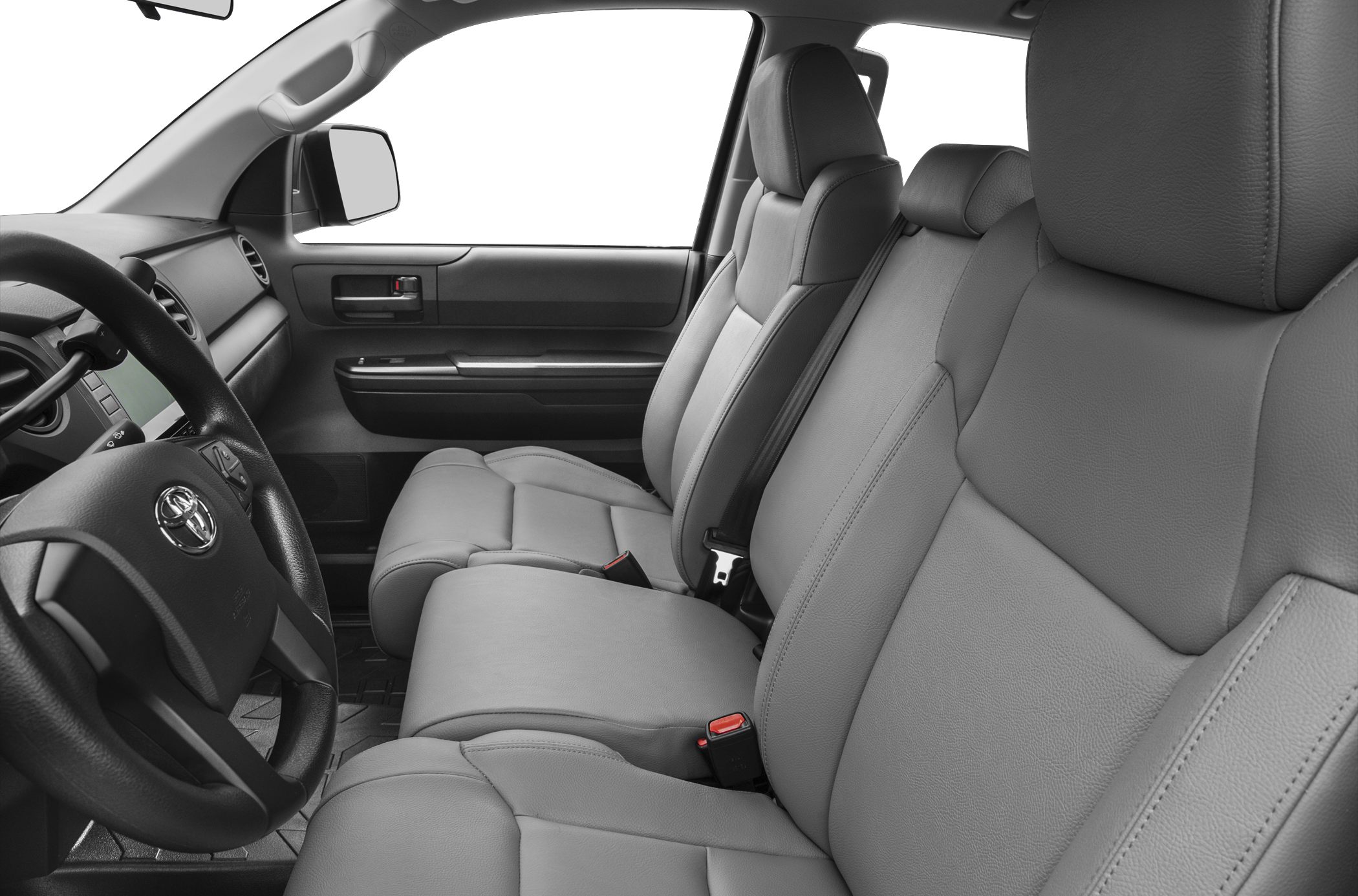 Front row seats and dashboard with steering wheel and controls