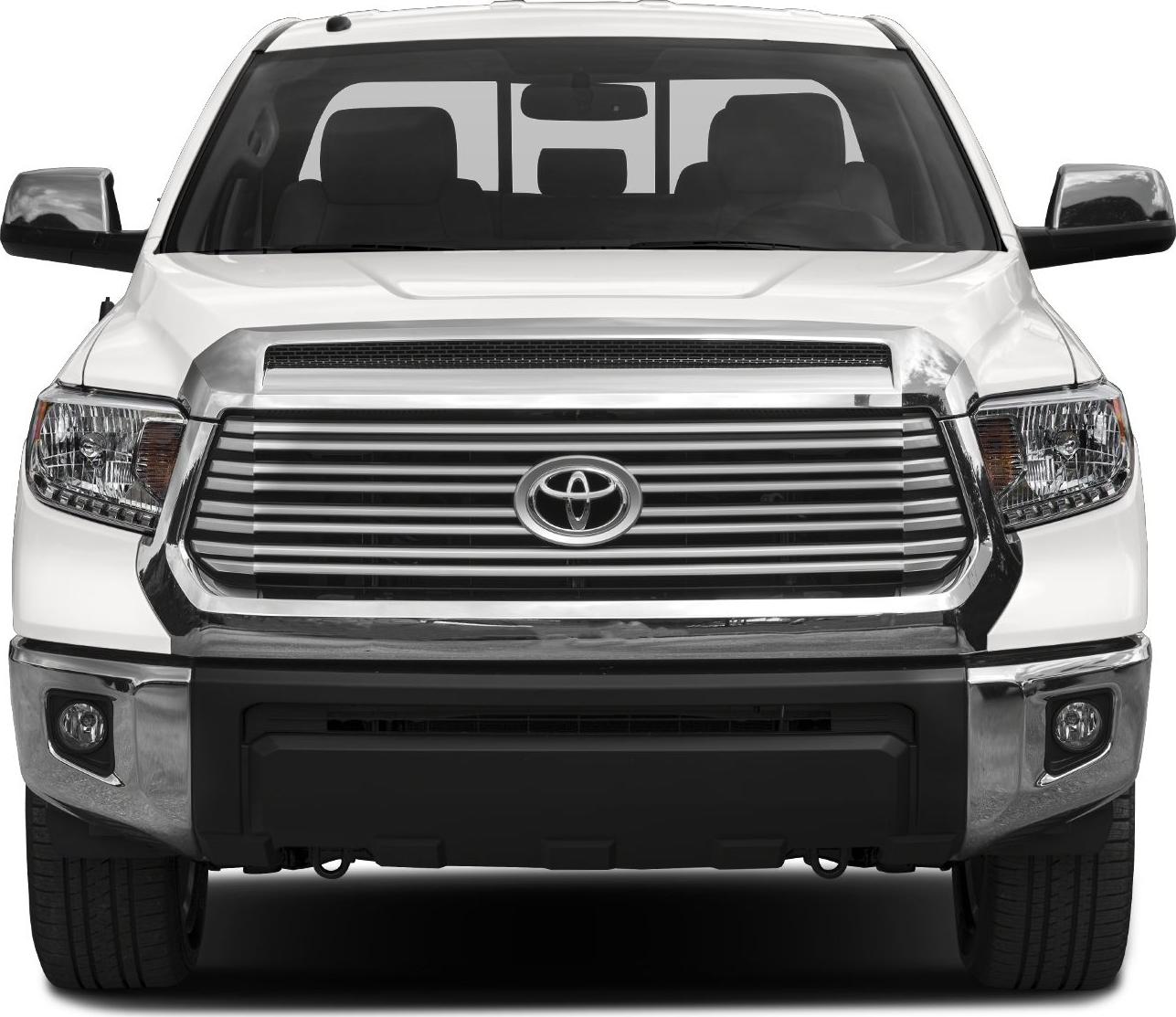 Front view of a truck with chrome grille and headlights