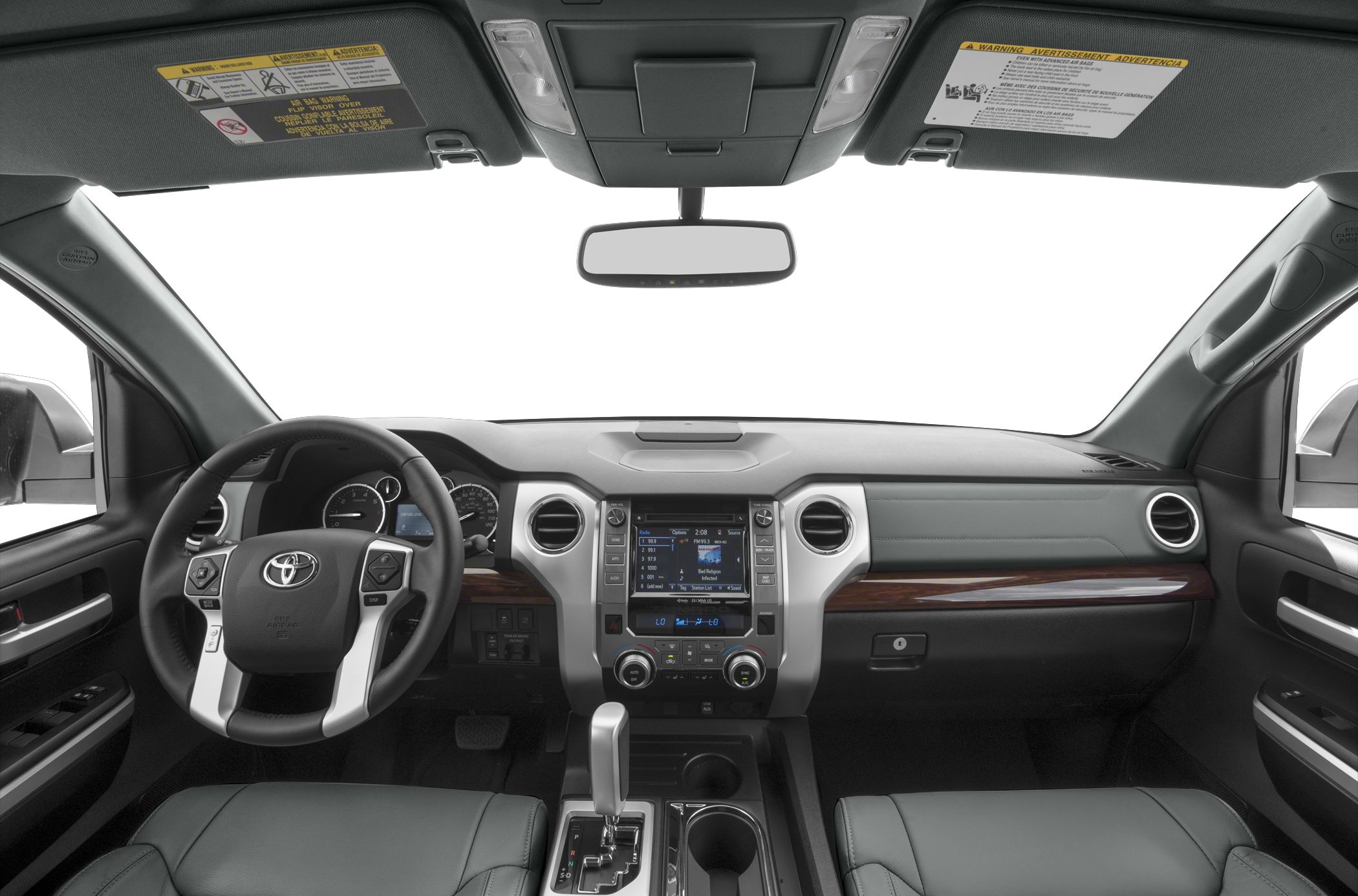 Modern steering wheel and central console dashboard with wood trim