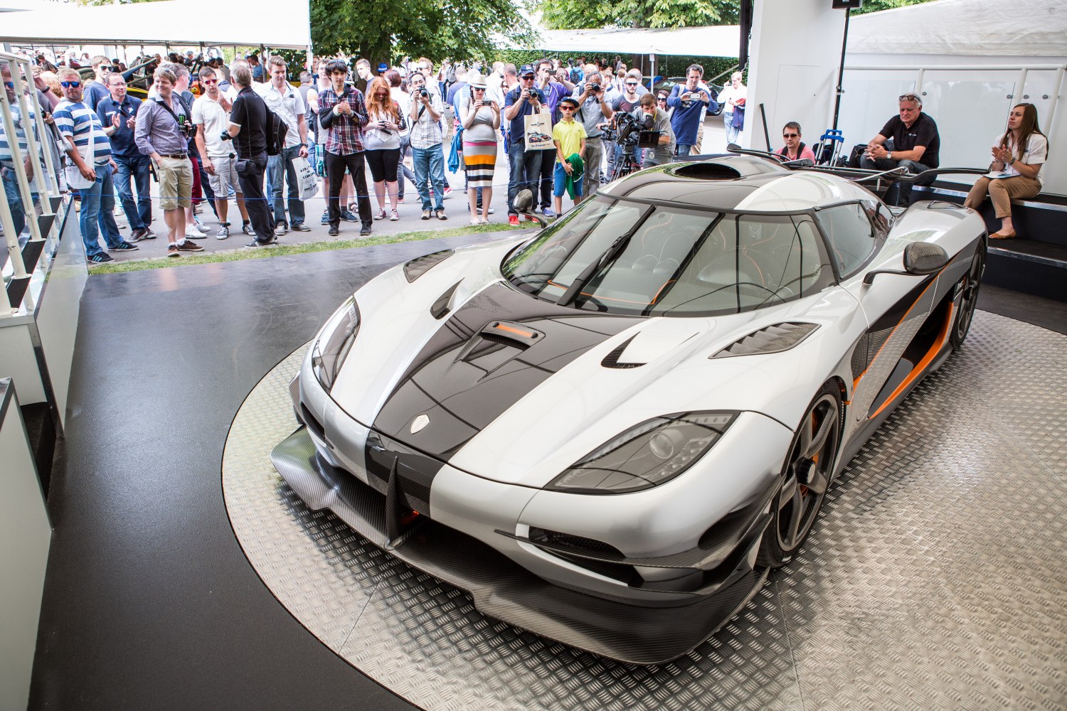 Front and side view of a high-performance hypercar with aerodynamic design.