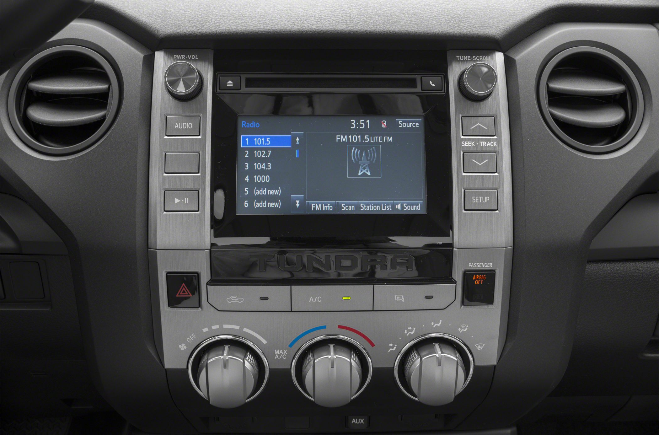 Infotainment screen and climate control knobs