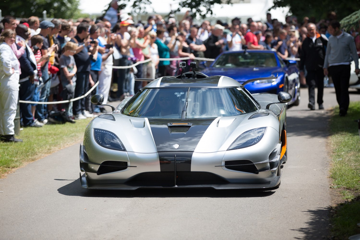 Front view of high-performance hypercar with carbon fiber aero features.