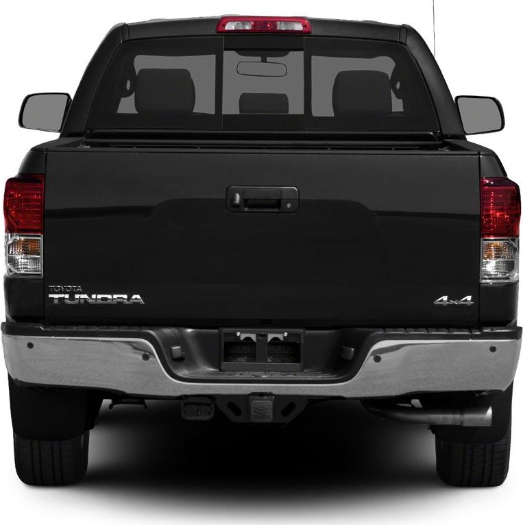 Rear view of a pickup truck with tailgate, dual exhaust, and 4x4 badge