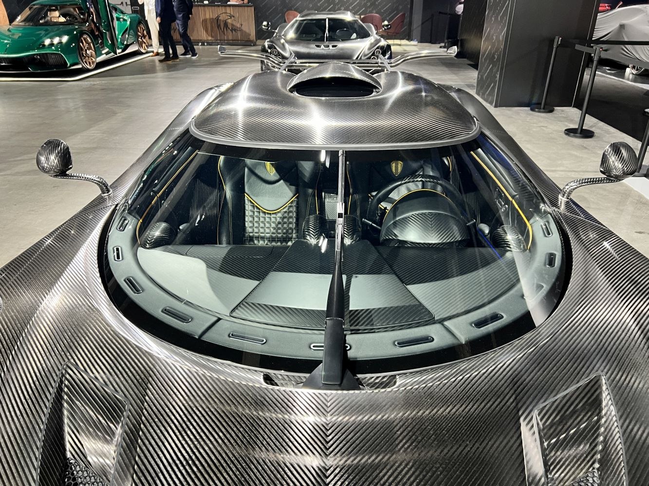 Carbon fiber body with split windshield and roof intake