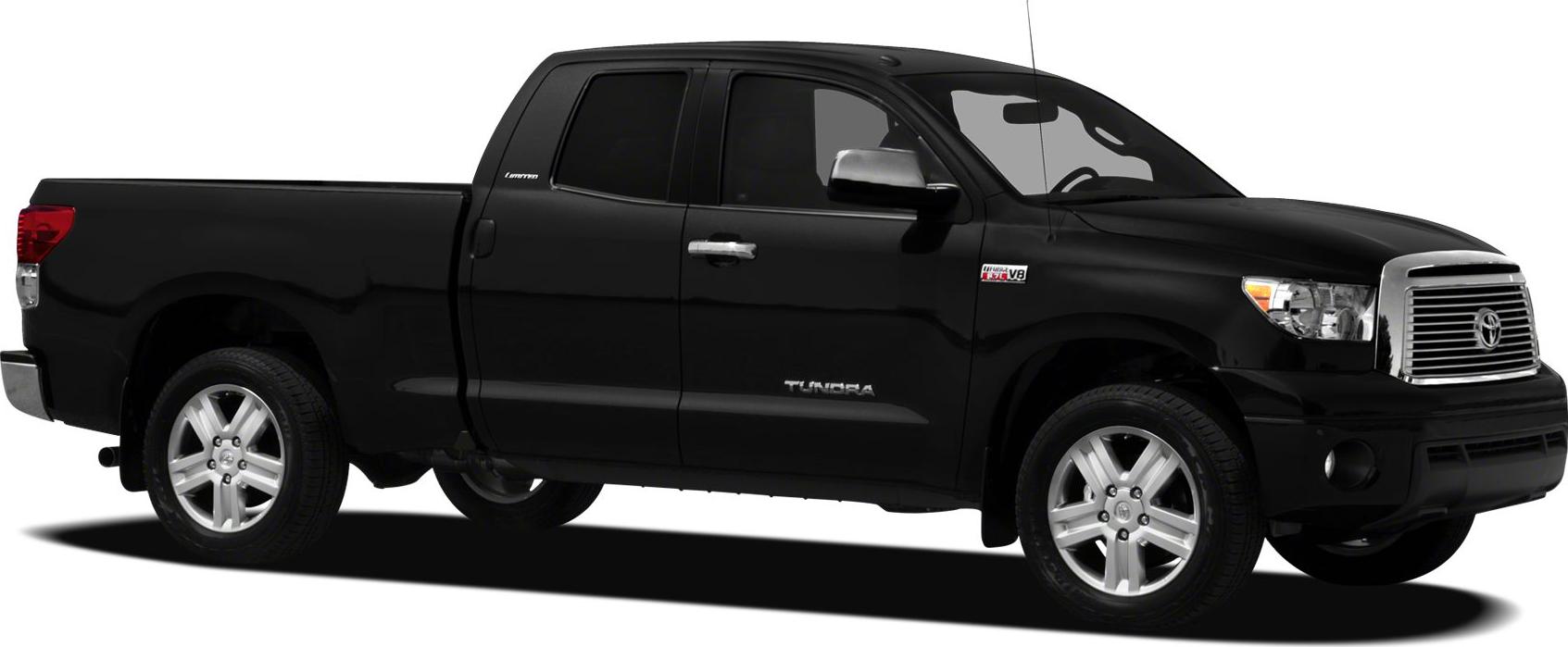 Side view of a black double cab pickup with chrome grille and alloy wheels
