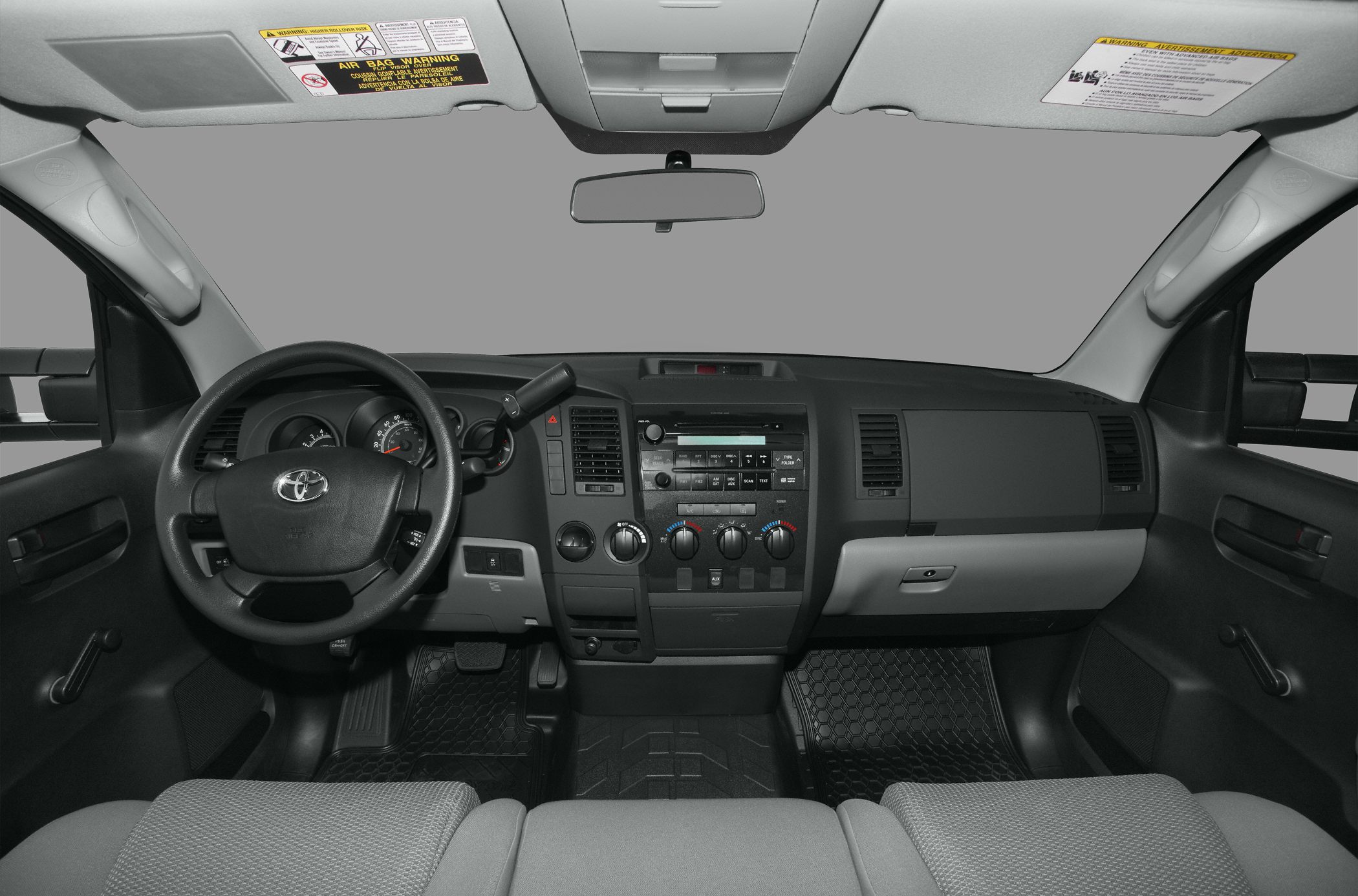 Dashboard and steering wheel view with center control panel in vehicle interior