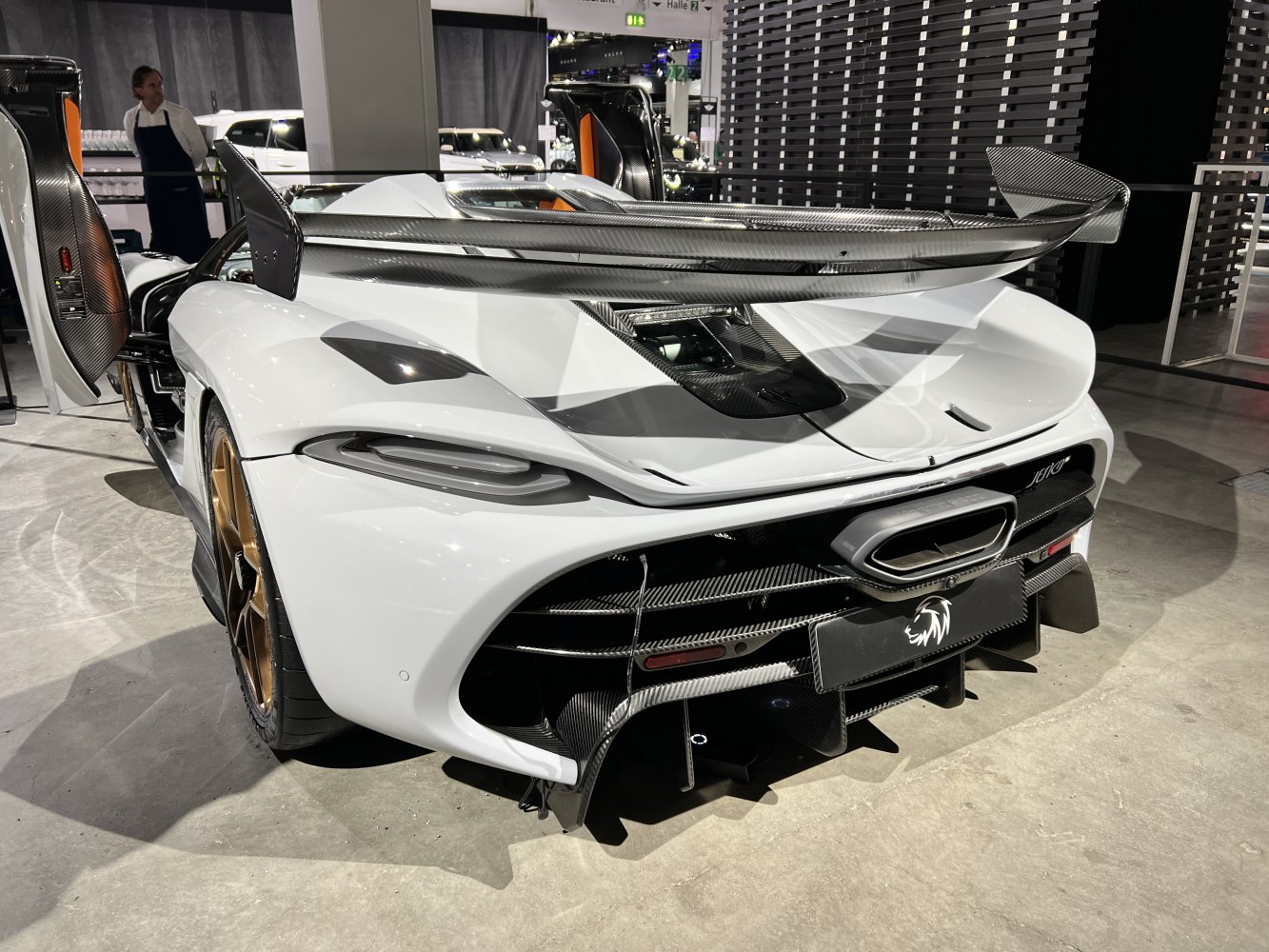 Rear view with large carbon fiber wing and diffuser