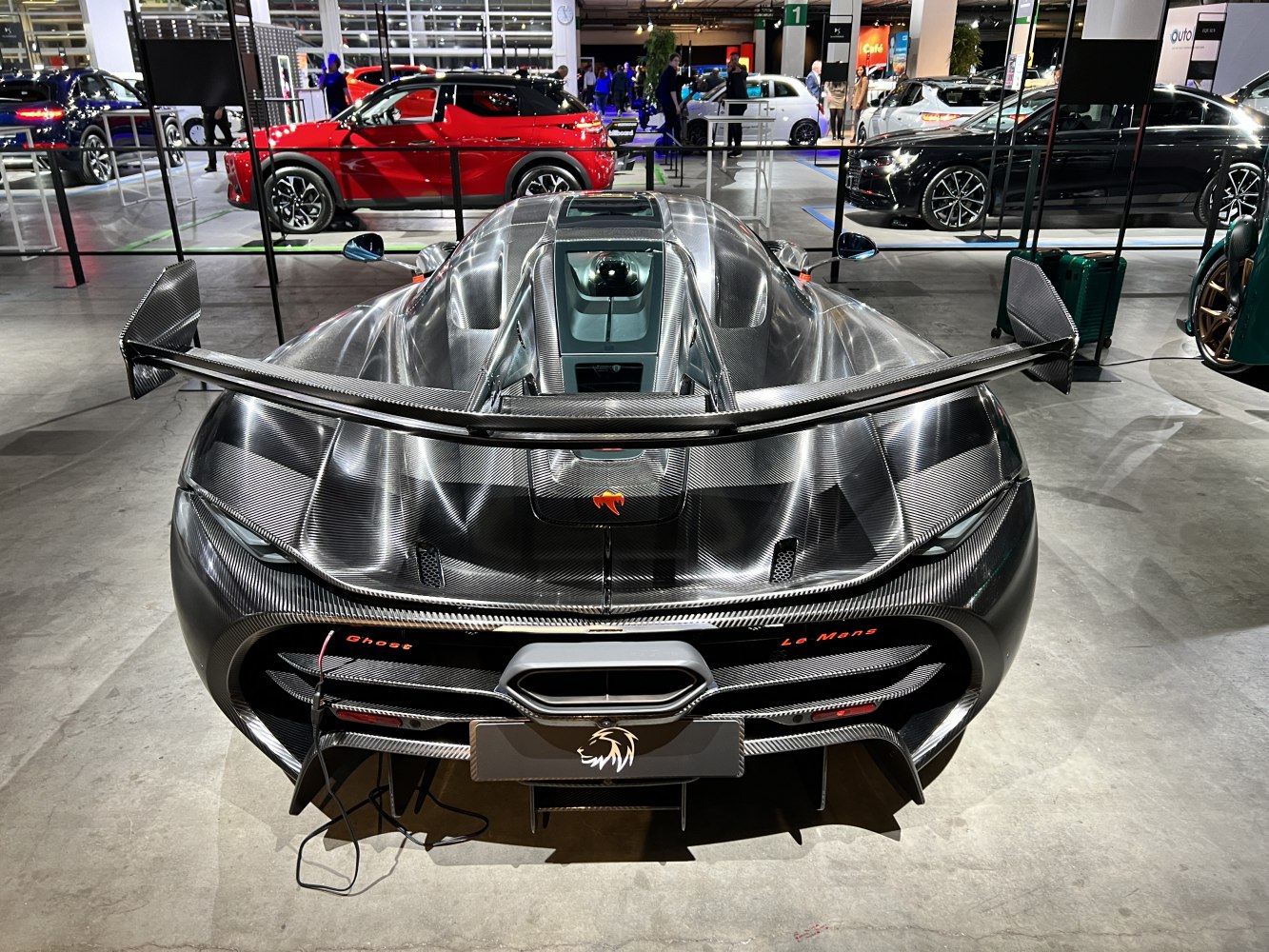 Carbon fiber rear with large aerodynamic wing and exhaust detail