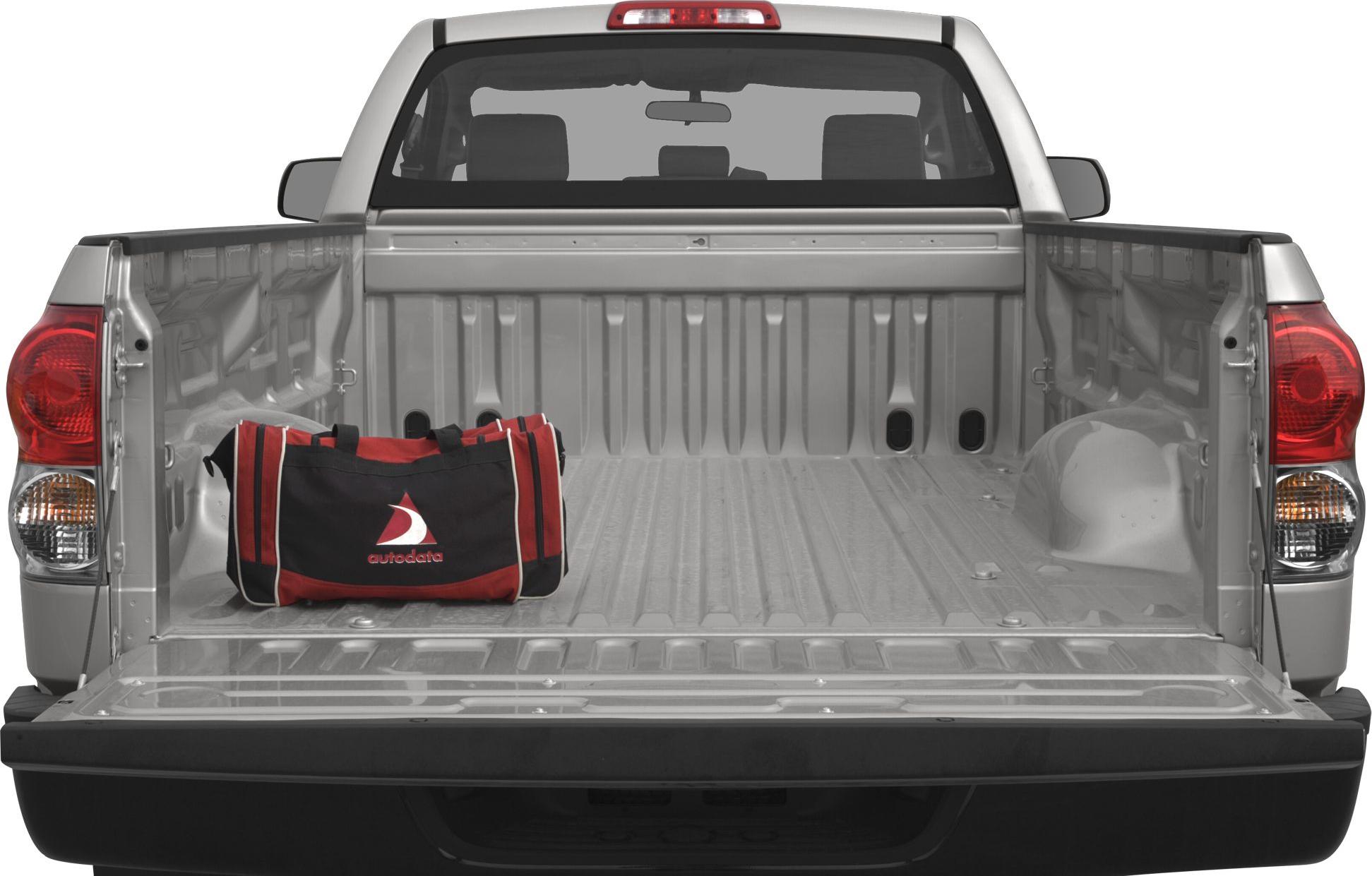 Open truck bed with tool bag and tail lights