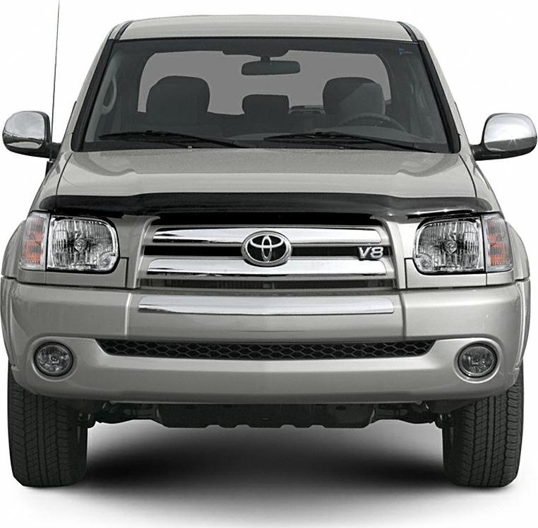 Front view of a truck with chrome grille and V8 badge
