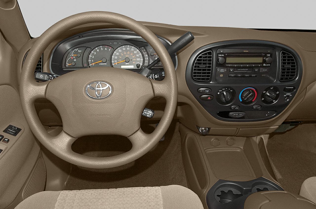 Steering wheel, dashboard, and control panel with analog gauges