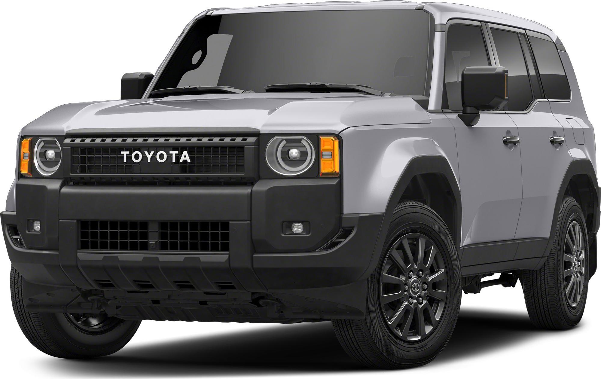 Front view of SUV with prominent grille and round LED headlights