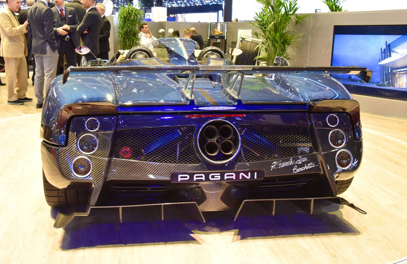 Rear view featuring quad exhaust and carbon fiber elements