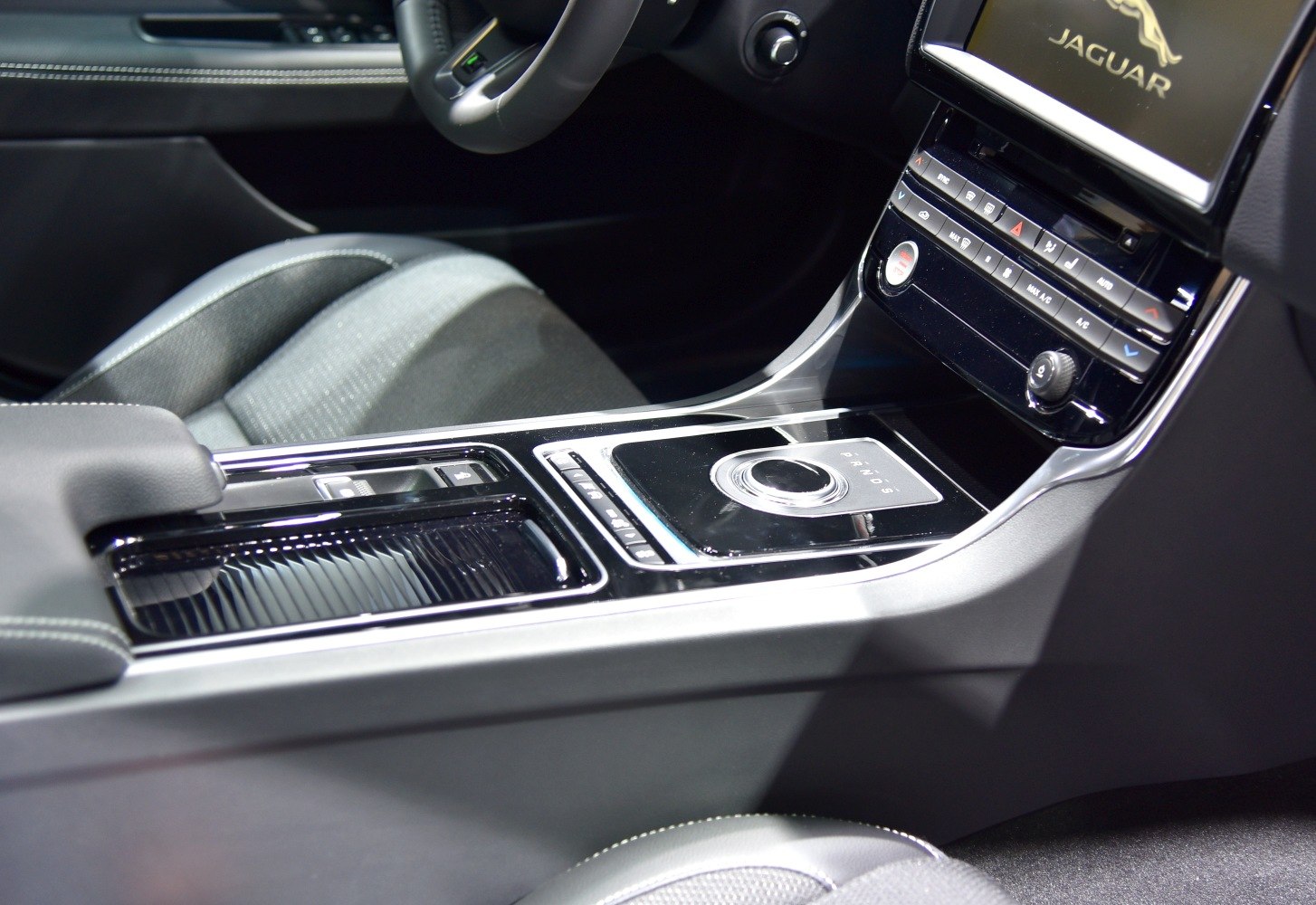 Rotary gear selector and center console design in car interior