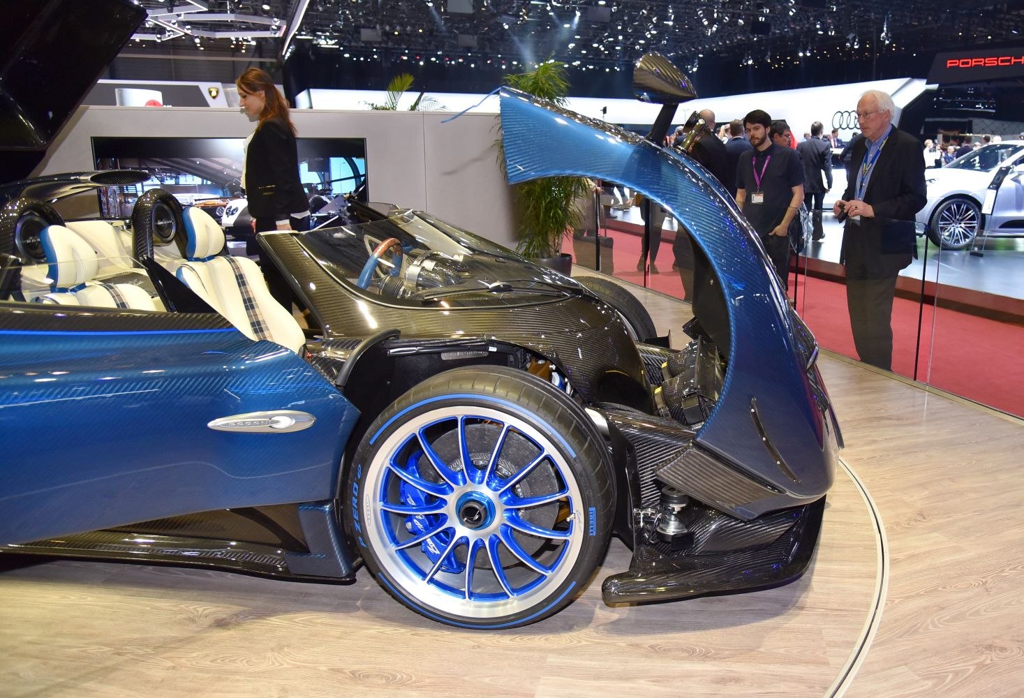 Blue alloy wheel and carbon fiber front with open hood