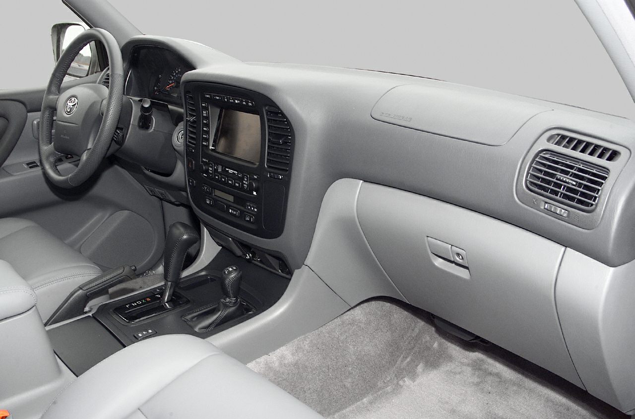 Dashboard and interior console with steering wheel and gear levers