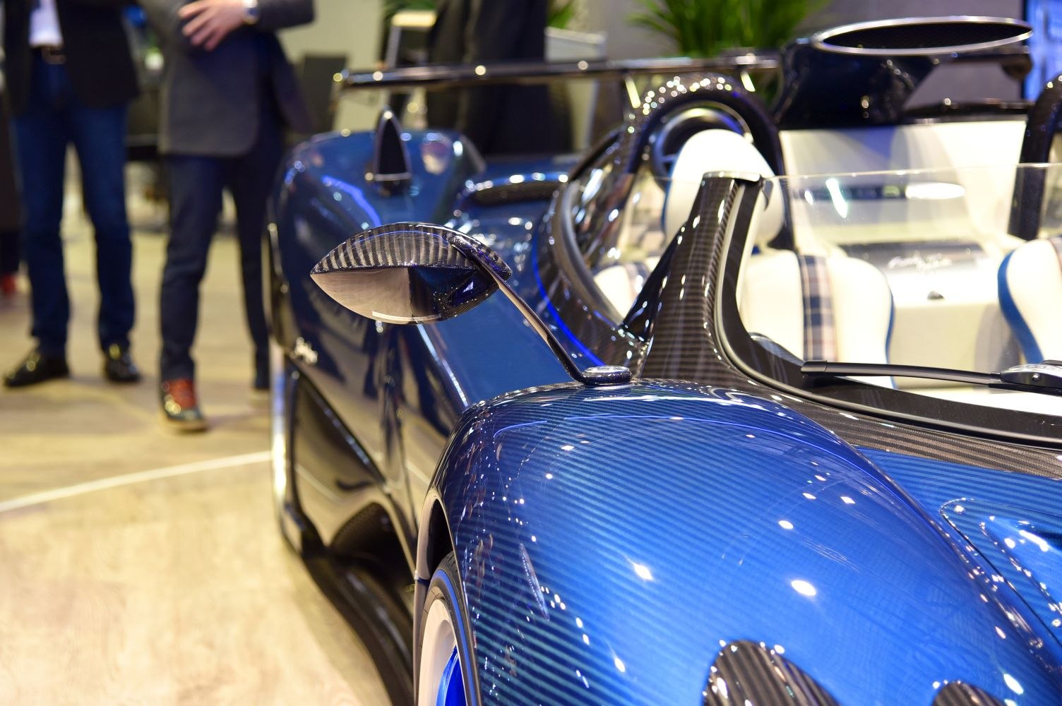 Blue carbon fiber side mirror and body detailing with white wheels