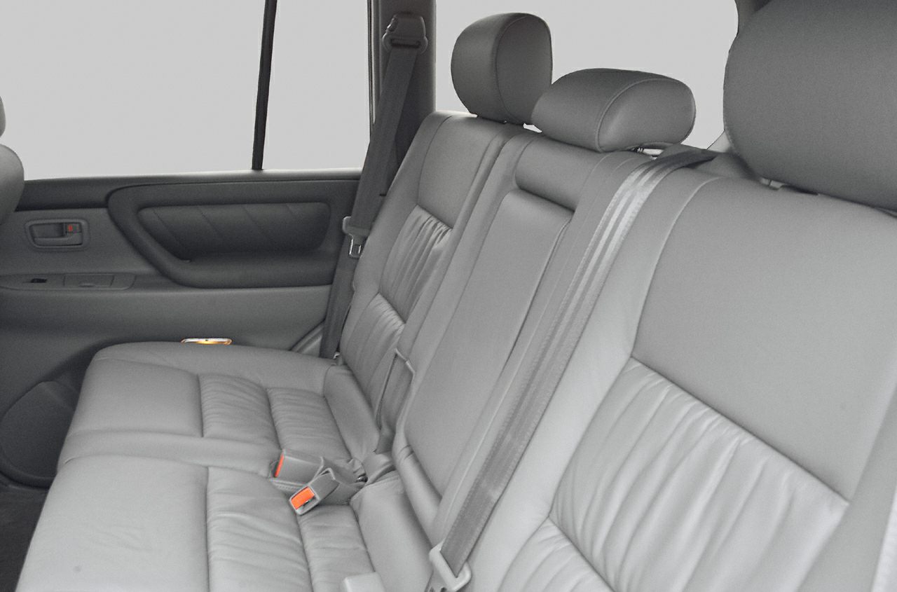 Rear leather seats with headrests and seat belts