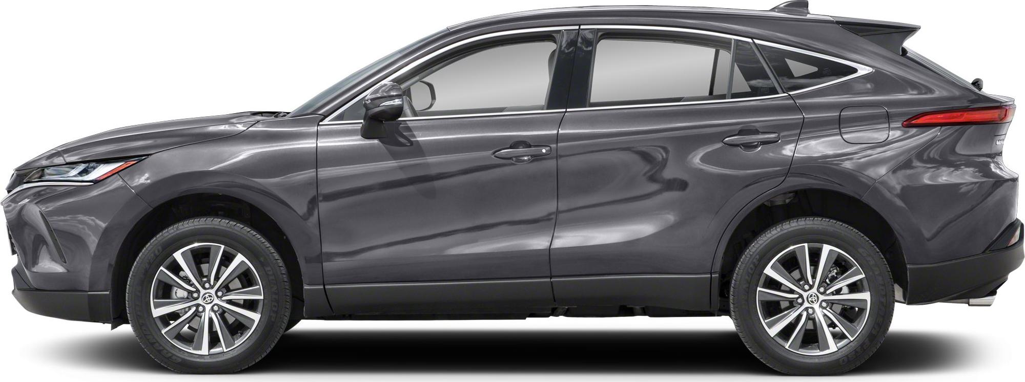 Side profile of a sleek SUV with aerodynamic lines and alloy wheels