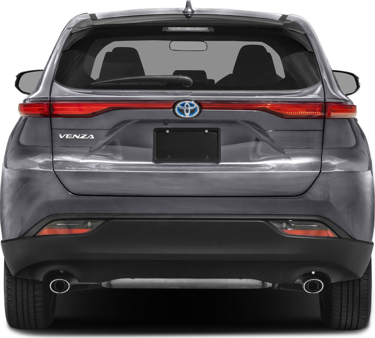 Rear view with distinctive tail light strip and dual exhaust tips