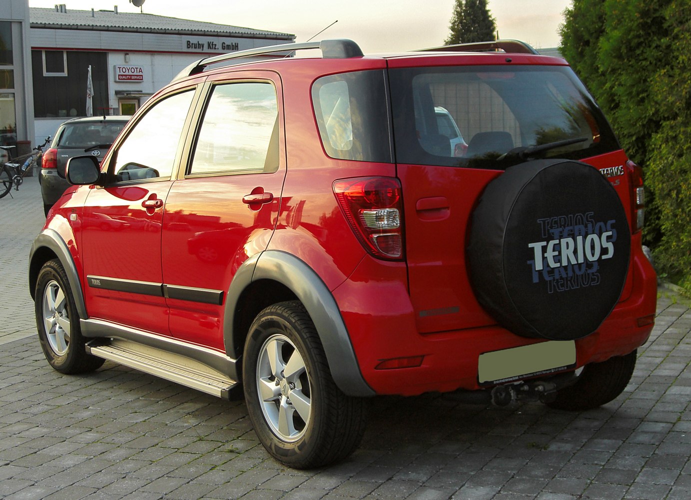 Rear side of SUV with spare wheel cover and alloy wheels