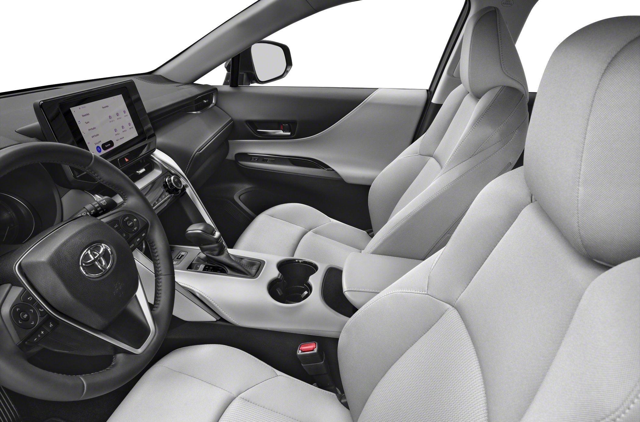 Modern dashboard and comfortable front seats in a car interior.