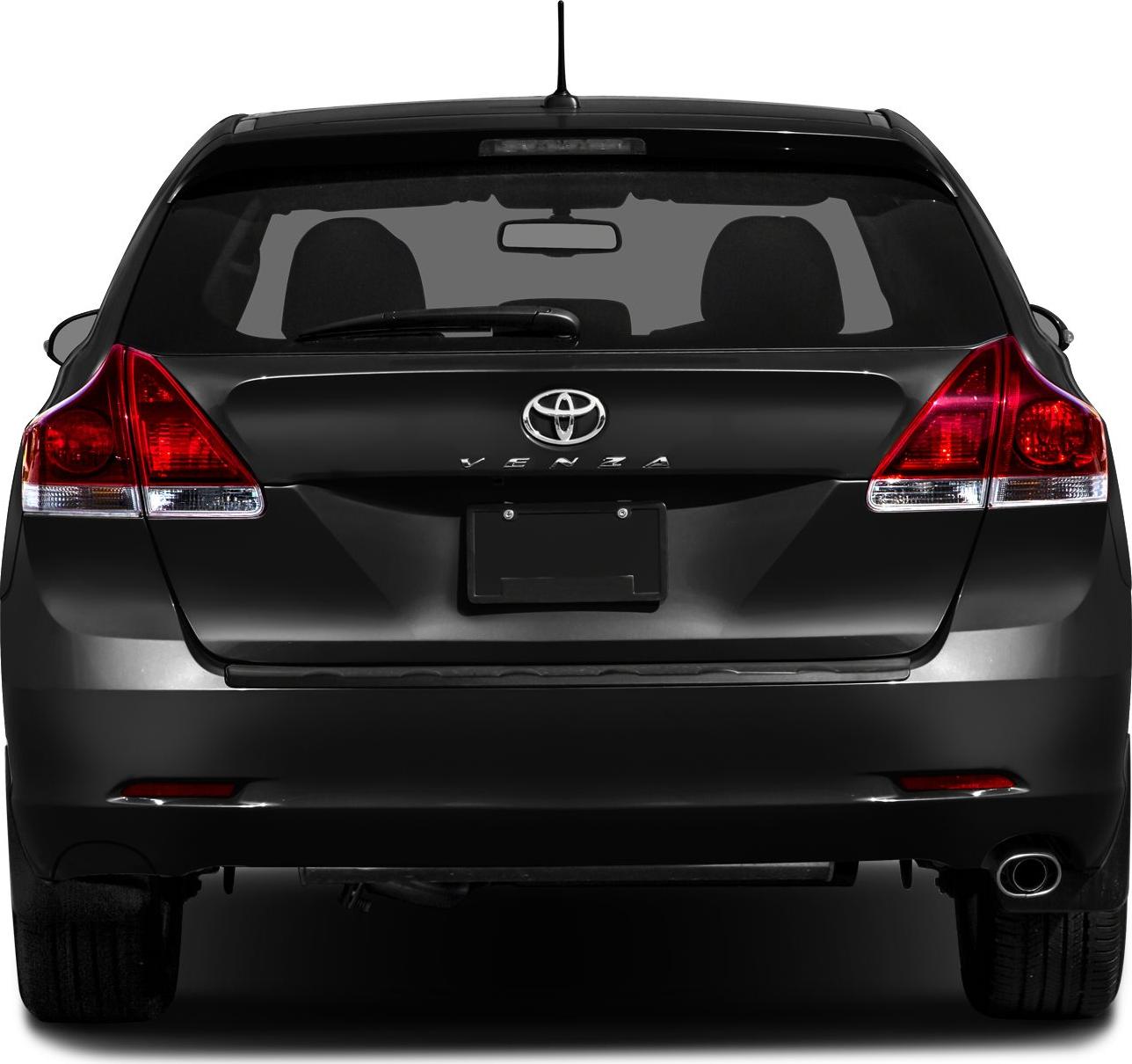 Rear view with tail lights, rear windshield wiper, and exhaust pipe