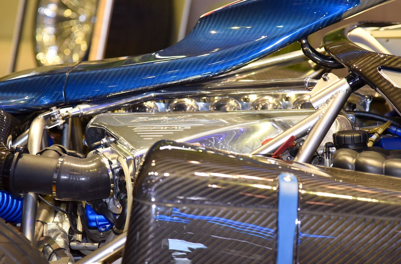 AMG engine bay with blue carbon fiber and metallic components