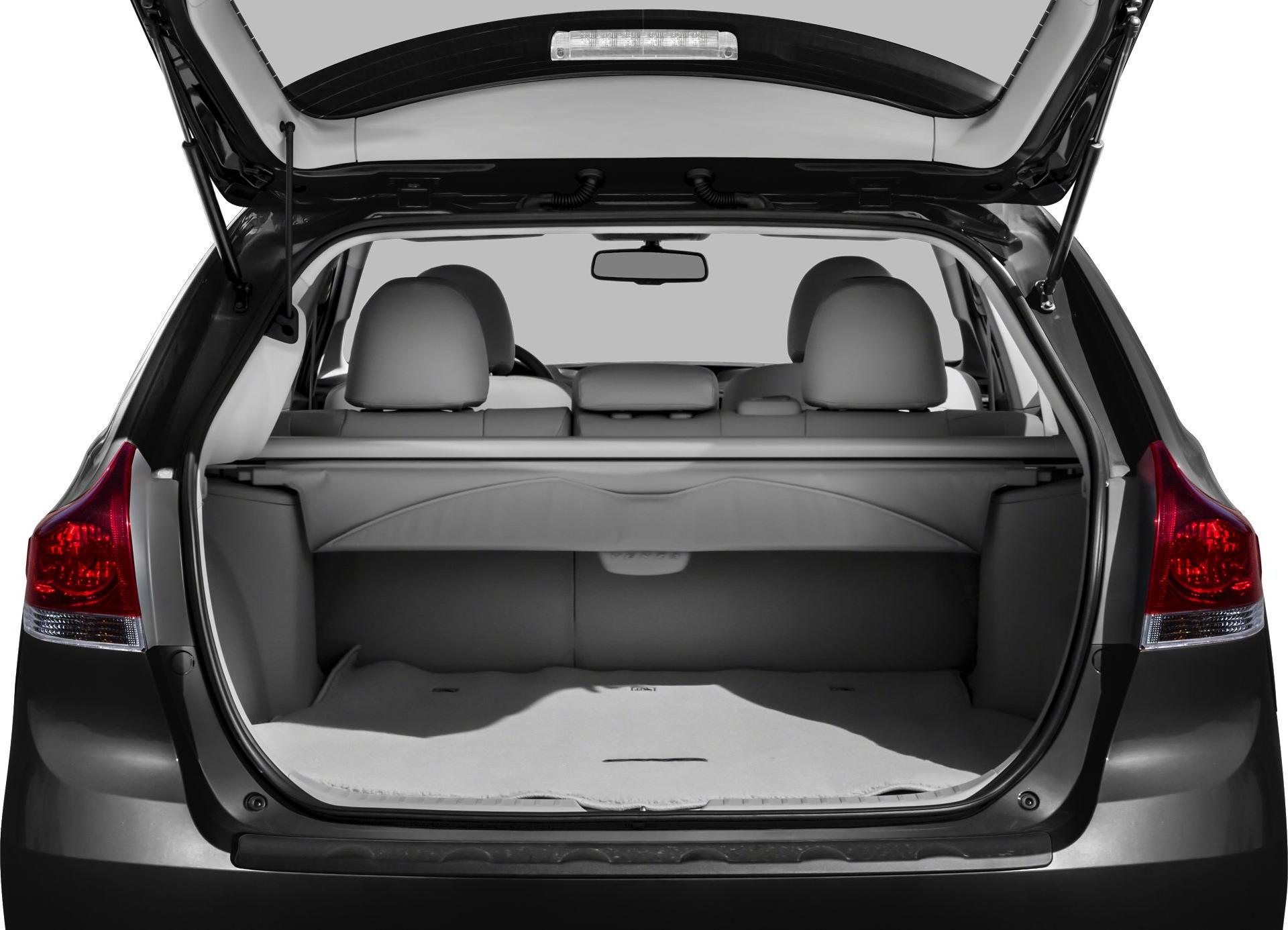 Open tailgate with spacious rear cargo area and visible rear seats interior.