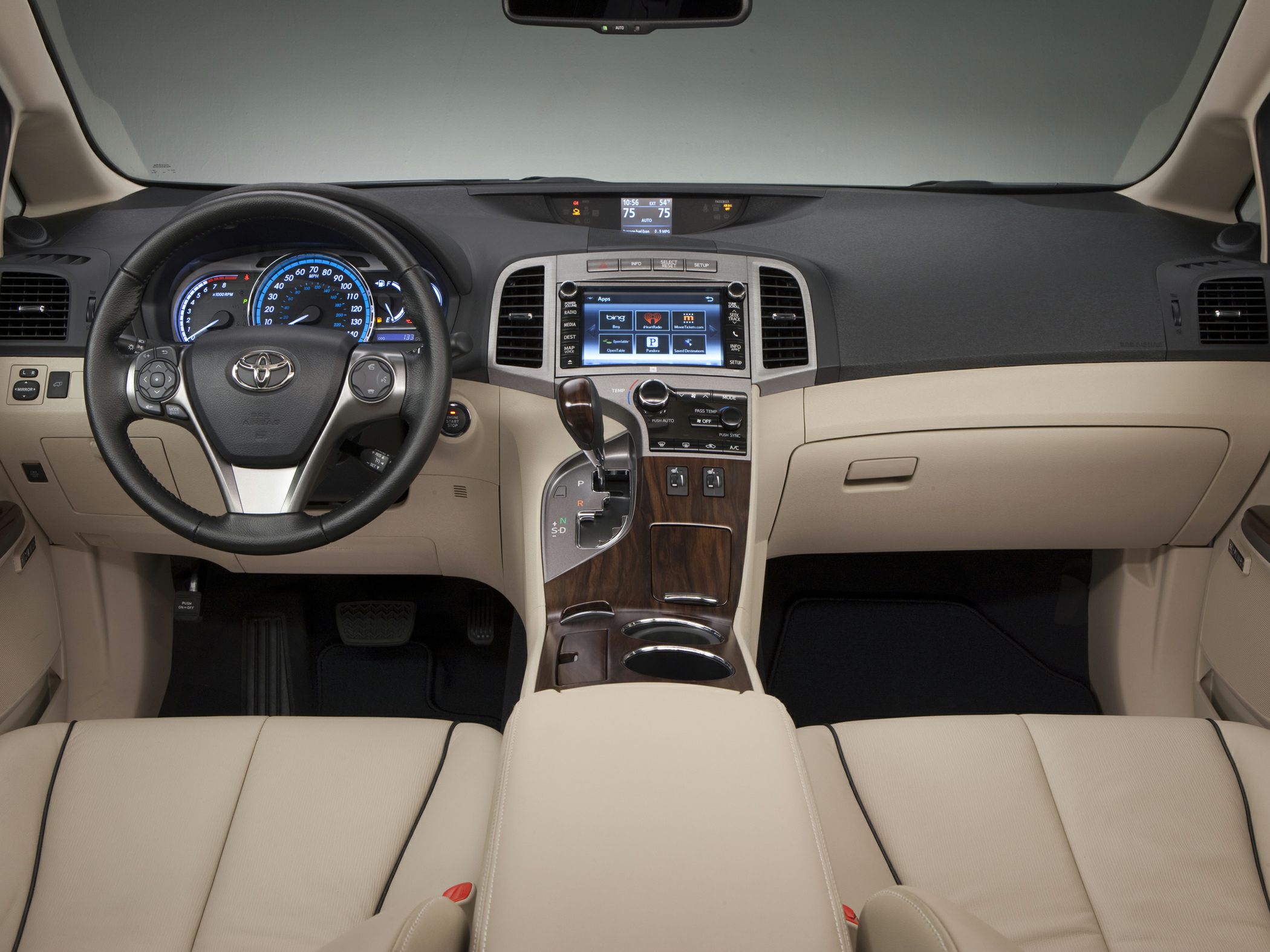 Leather interior with dashboard, touchscreen, and multifunction steering wheel