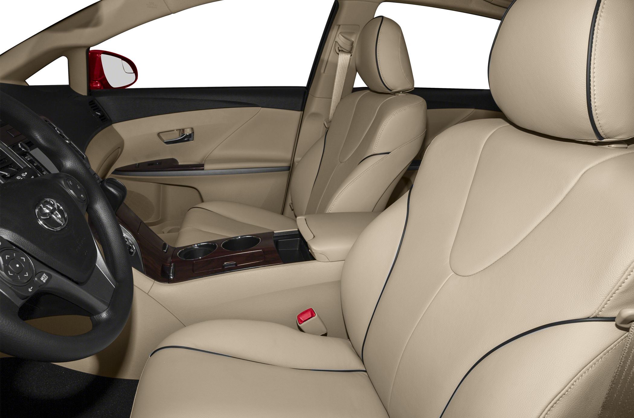 Beige leather front seats with black piping and wood trim center console