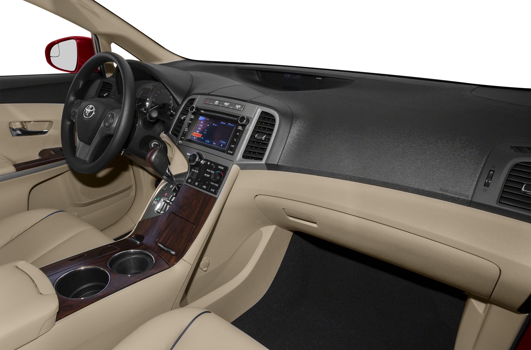 Dashboard and center console with beige leather seating