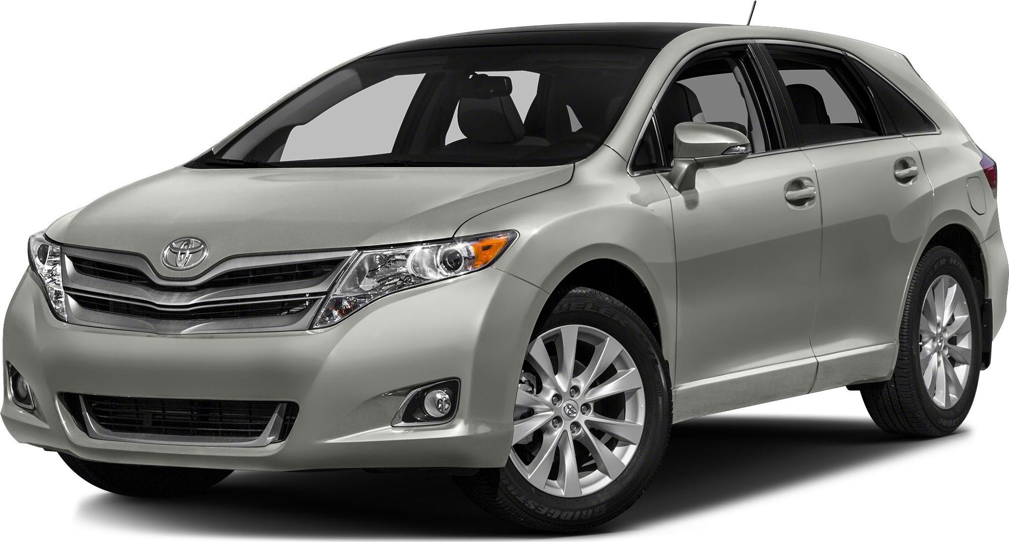 Silver mid-size crossover front side view showcasing headlights and alloy wheels