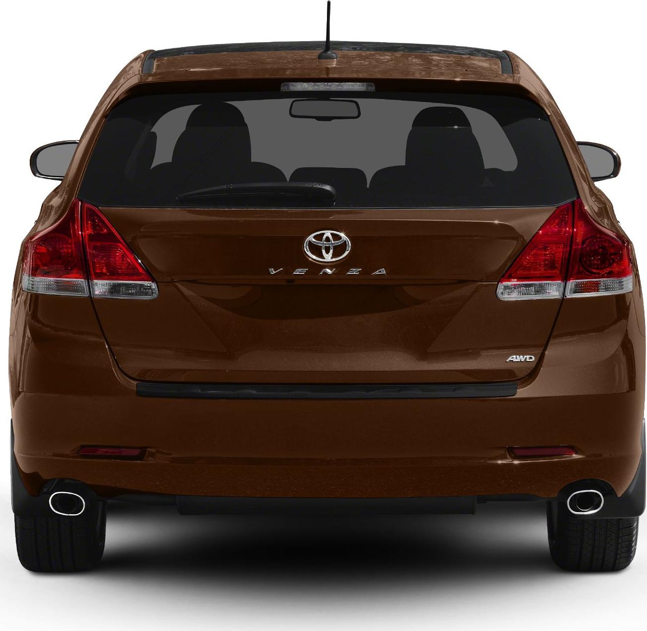 Rear view showing dual exhaust and AWD badge