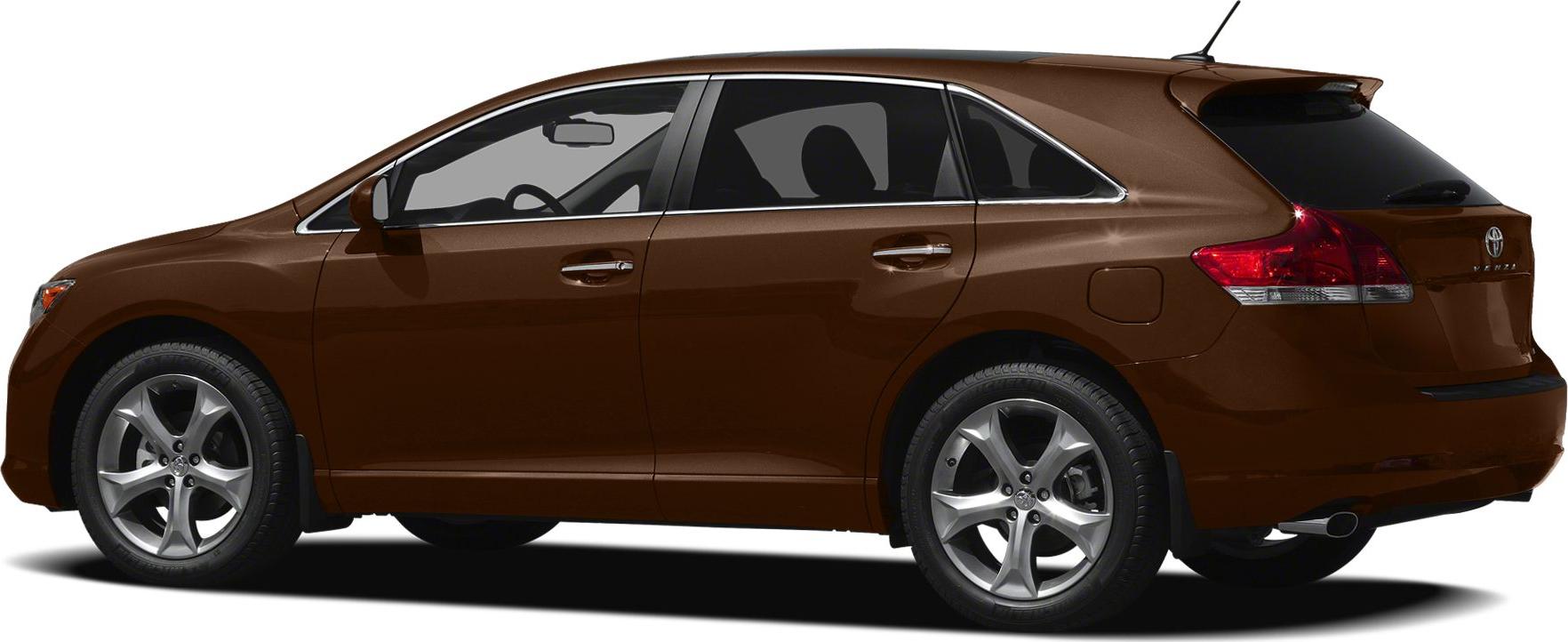 Side profile of brown mid-size SUV with alloy wheels