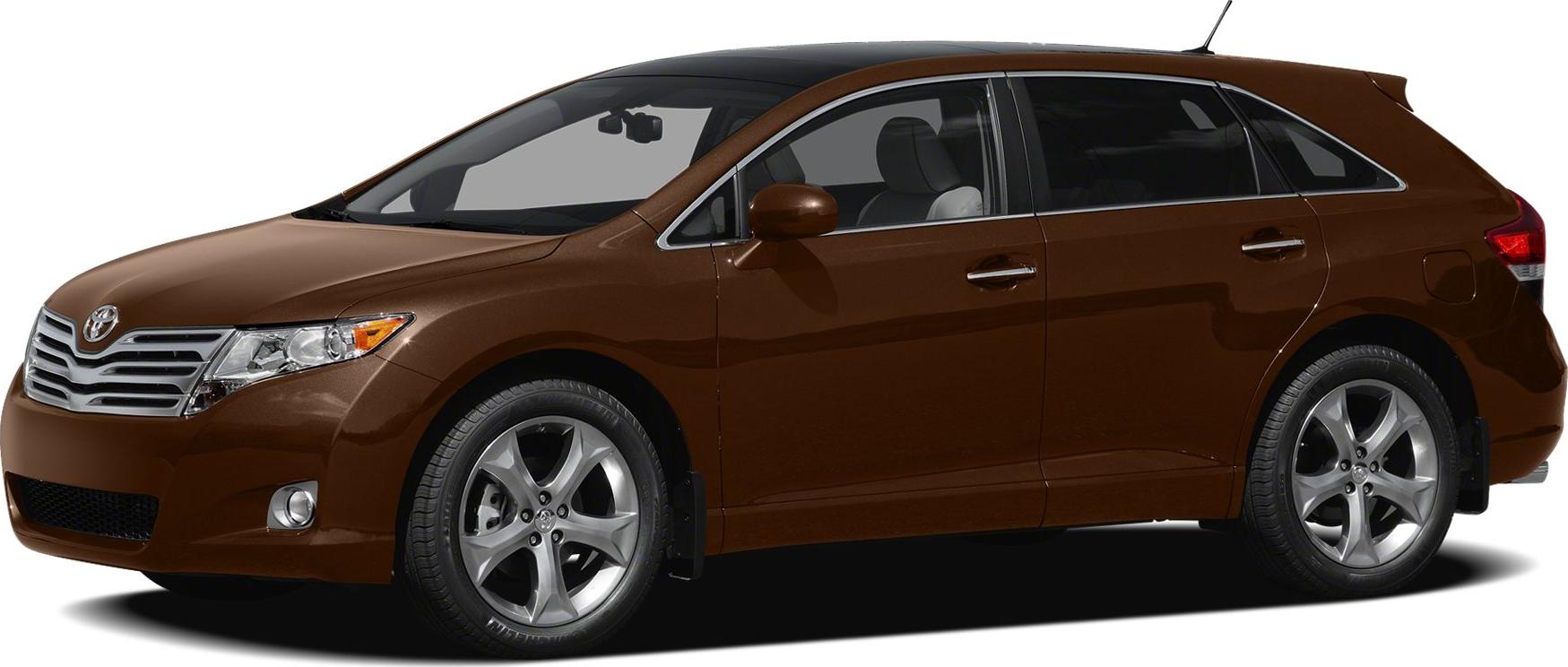 Side profile of brown mid-size crossover SUV with chrome grille and alloy wheels