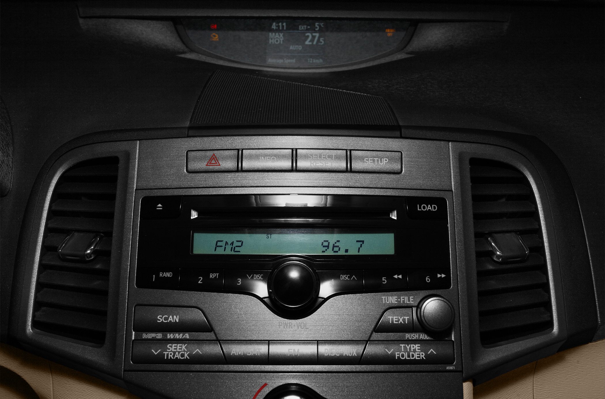 Front radio console with digital FM display and control buttons