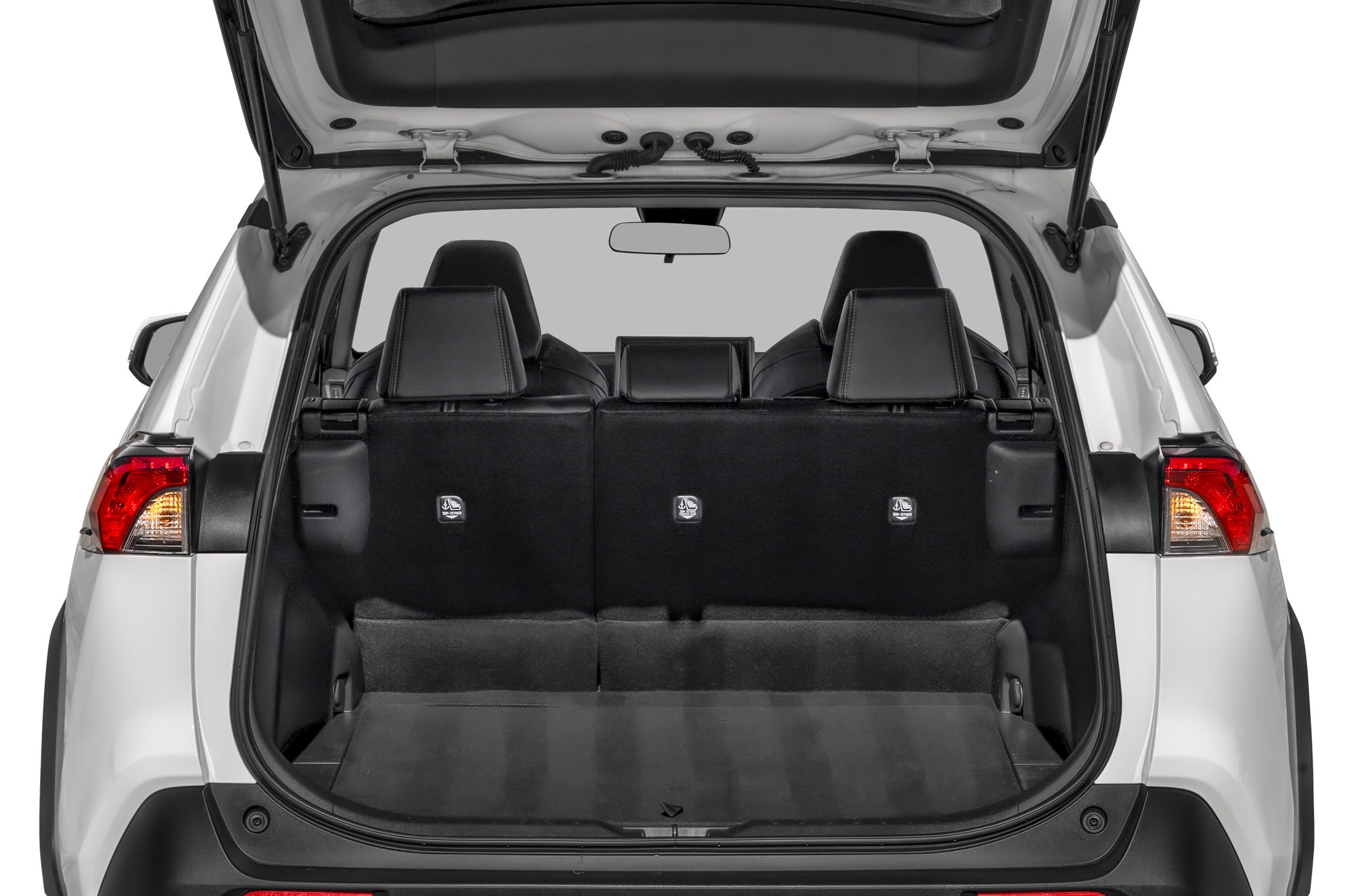 Open trunk with spacious cargo area and rear seat backs