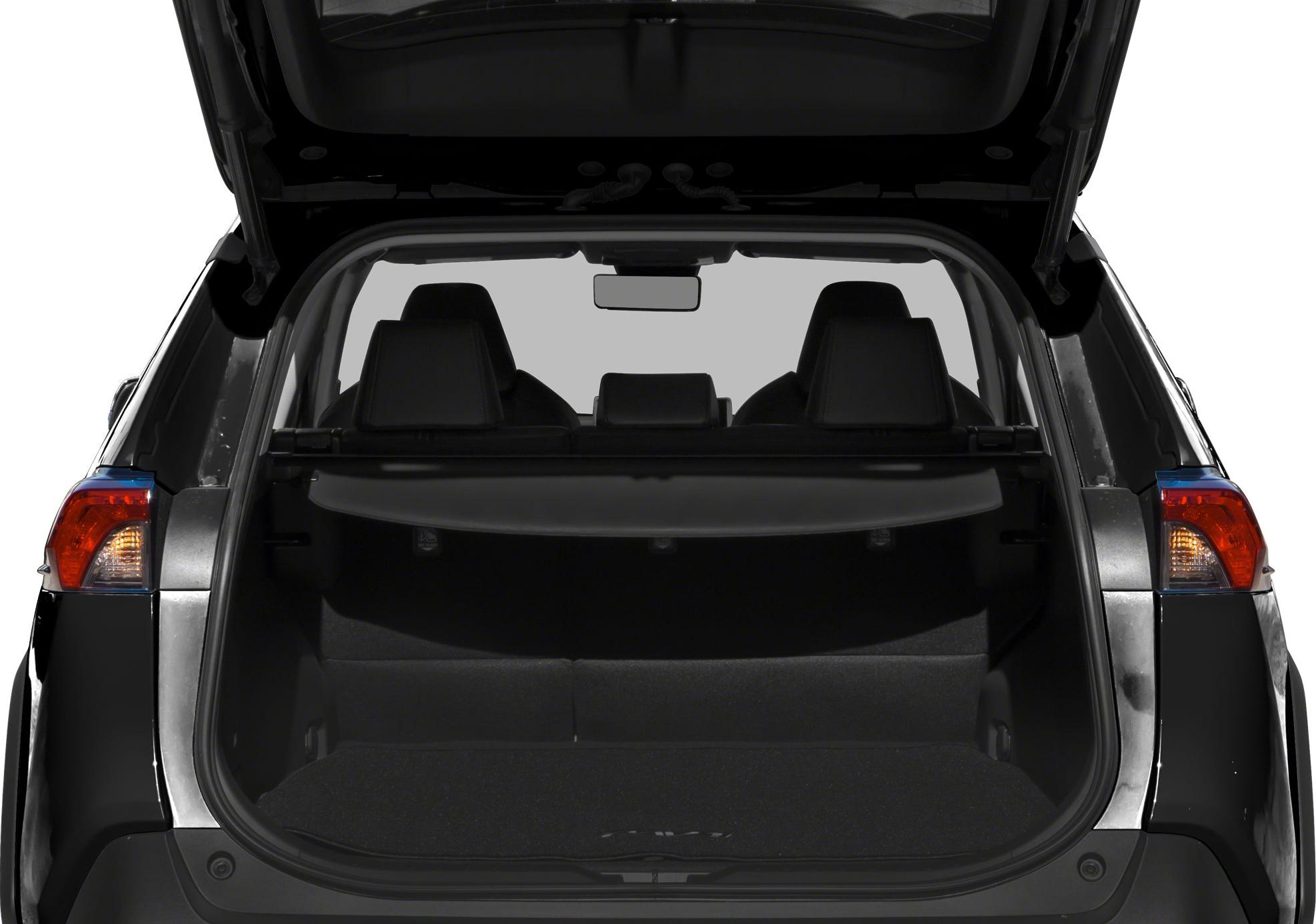 Spacious open rear trunk with visible back seats