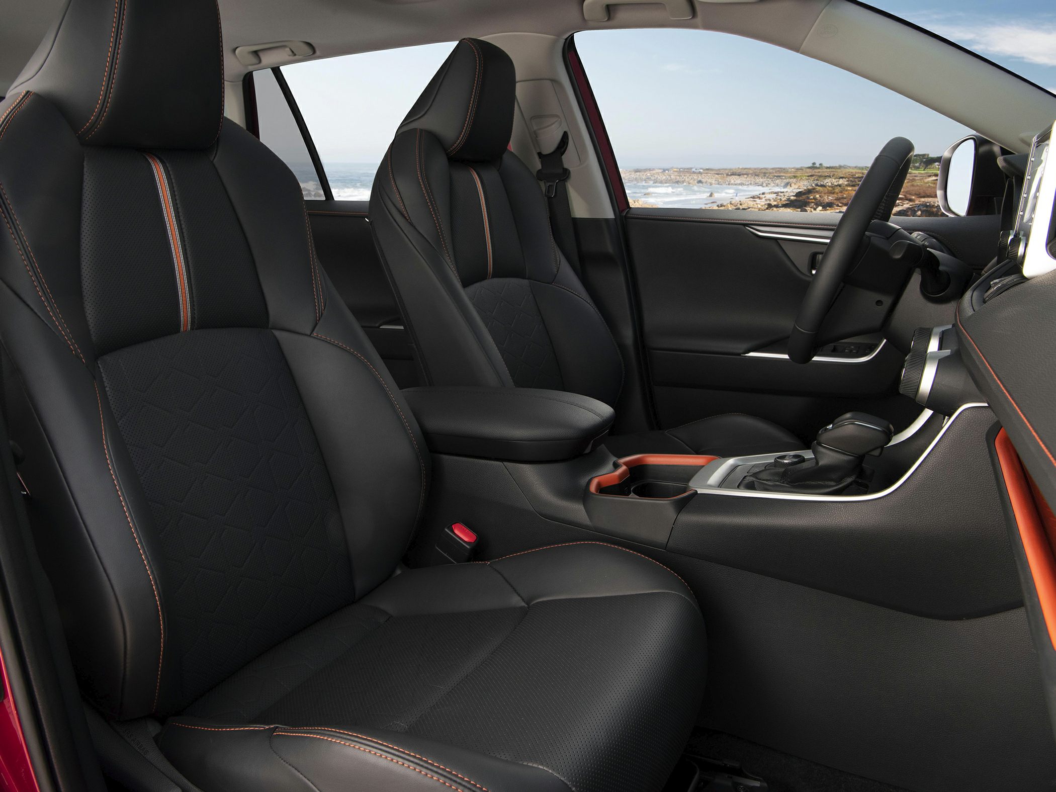 Modern SUV interior with premium seats and center console.