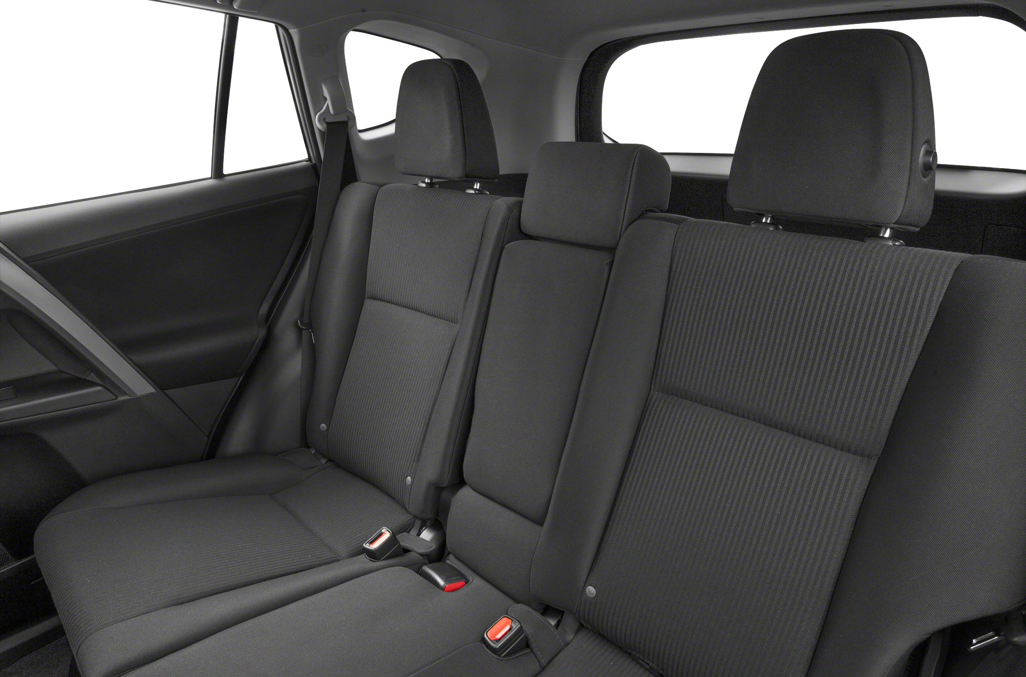 Black cloth rear seats with adjustable headrests and visible seat belt buckles