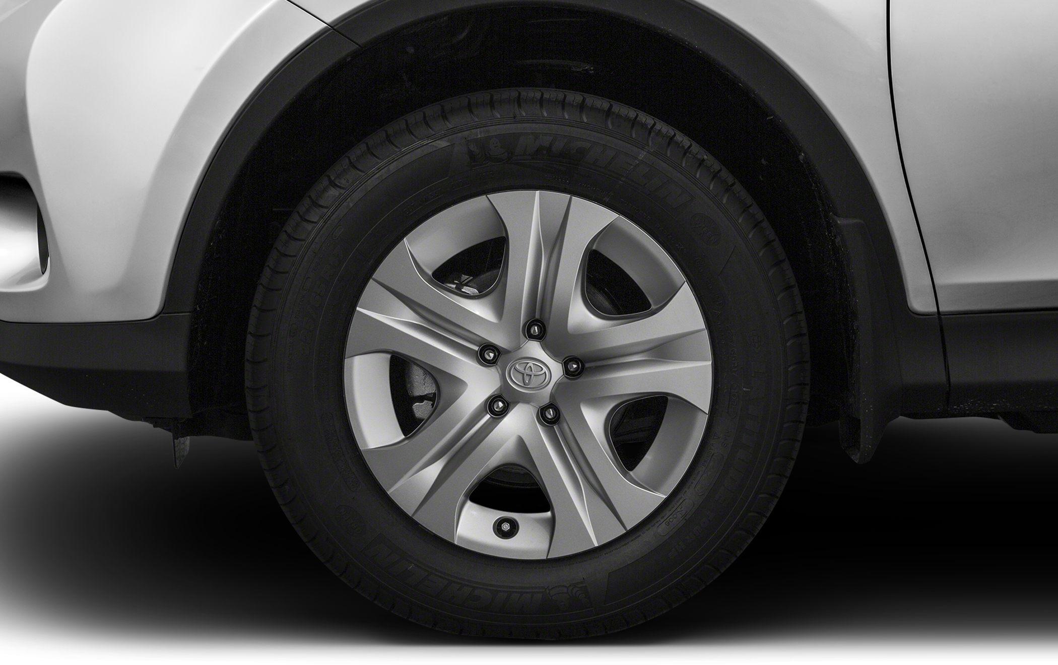 Close-up of alloy wheel and tire of a mid-2010s SUV