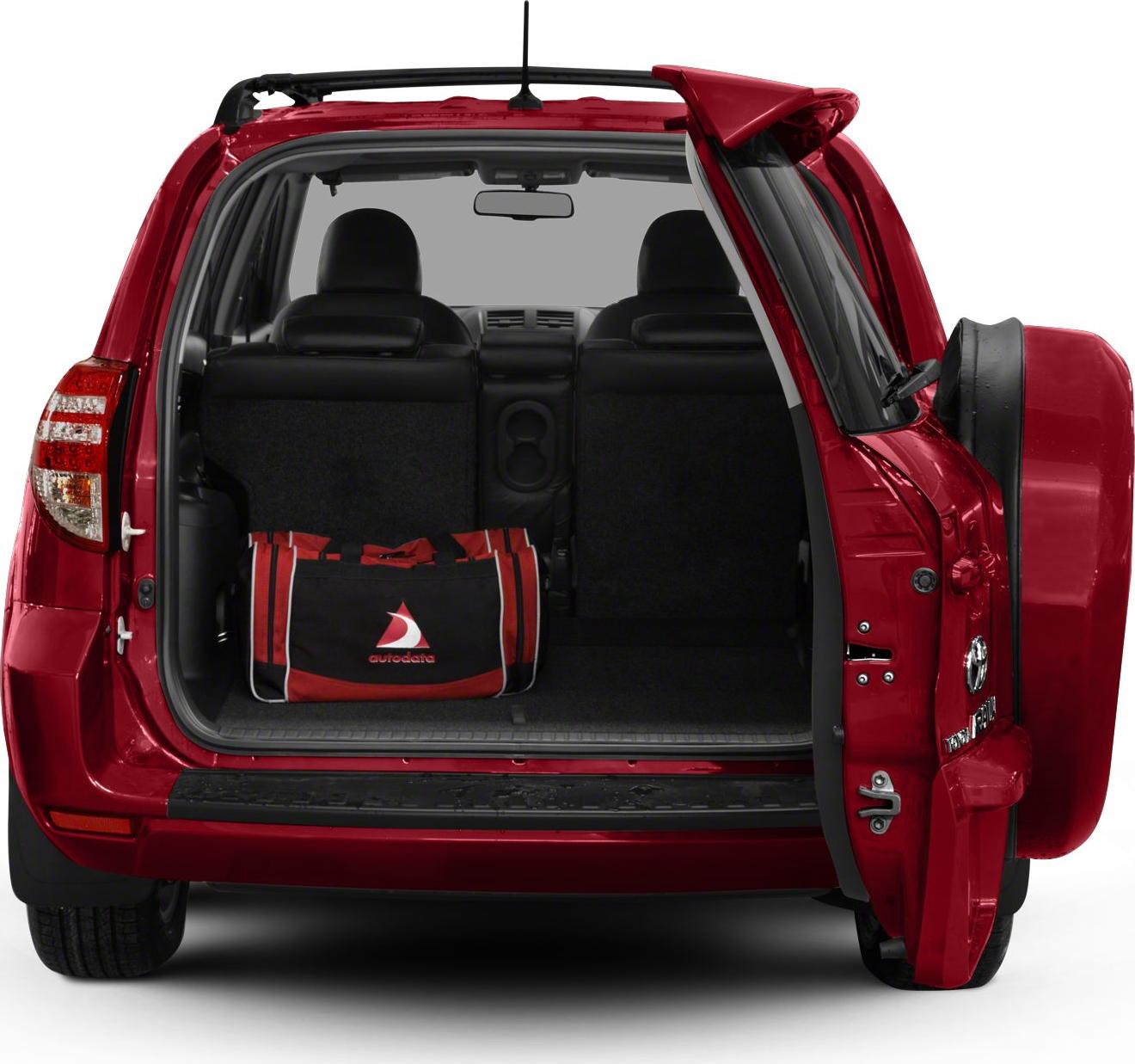 Rear cargo space with open side-hinged tailgate and external spare tire
